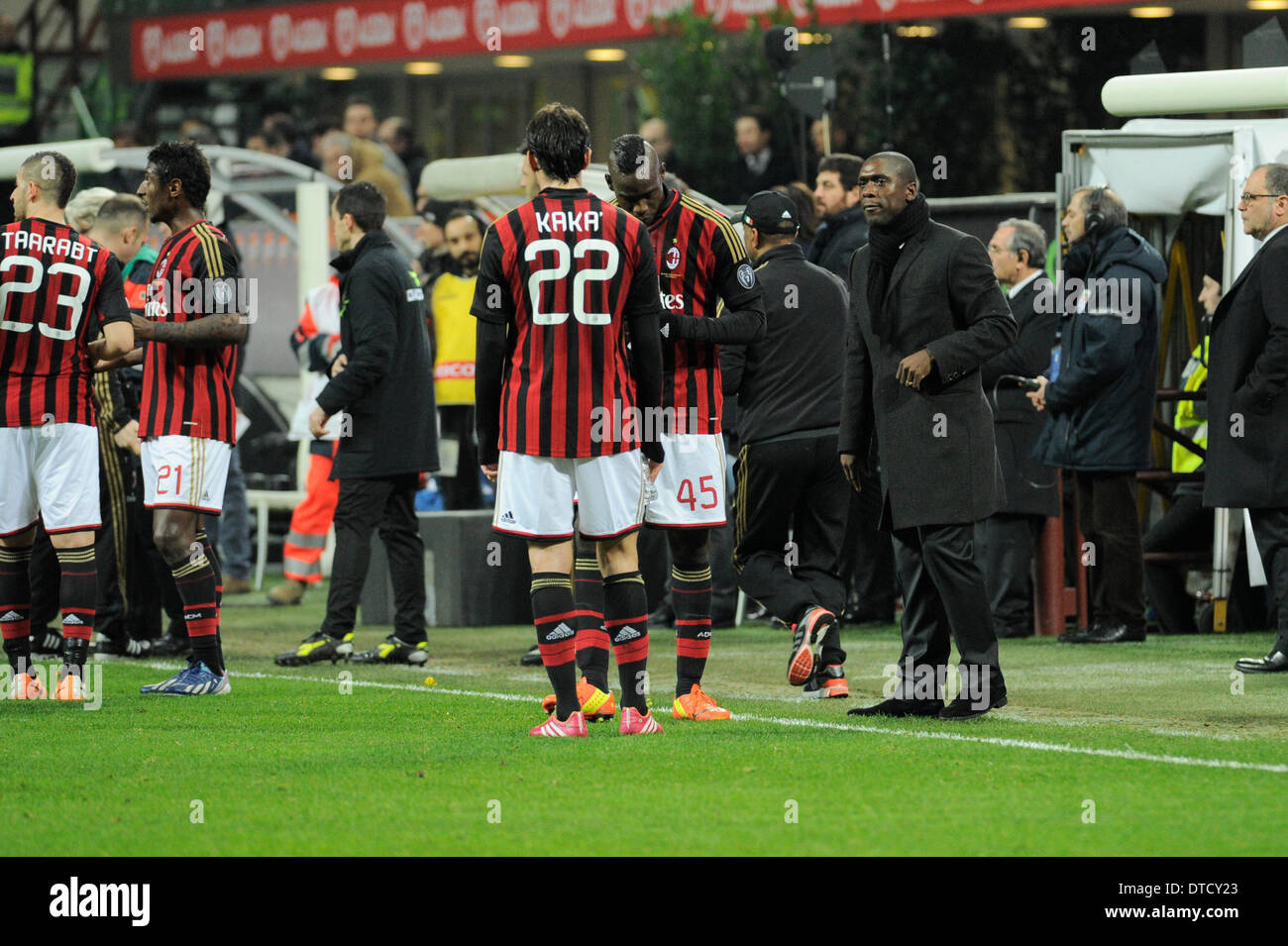 MIlan, Italy. 14th Feb, 2014. Head coach AC Milan Clarence Seedorf (R) and Mario Balotelli (L) talk during the Italian Serie A League soccer match between AC Milan v Bologna FC at San Siro Stadium in Milan, Italy, friday, Feb. 14, 2014. Credit:  Action Plus Sports/Alamy Live News Stock Photo