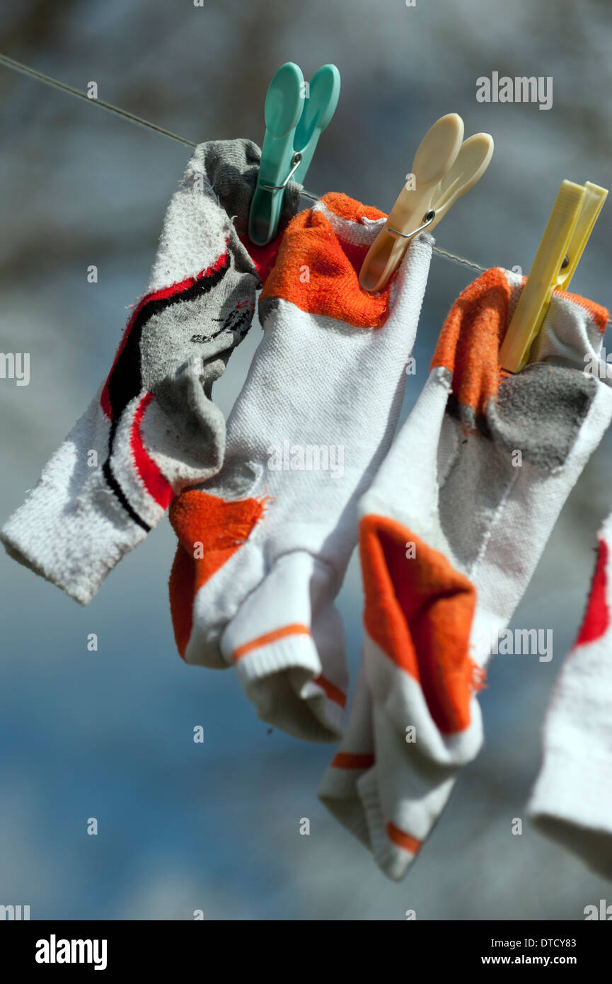 socks hanging on washing line Stock Photo Alamy