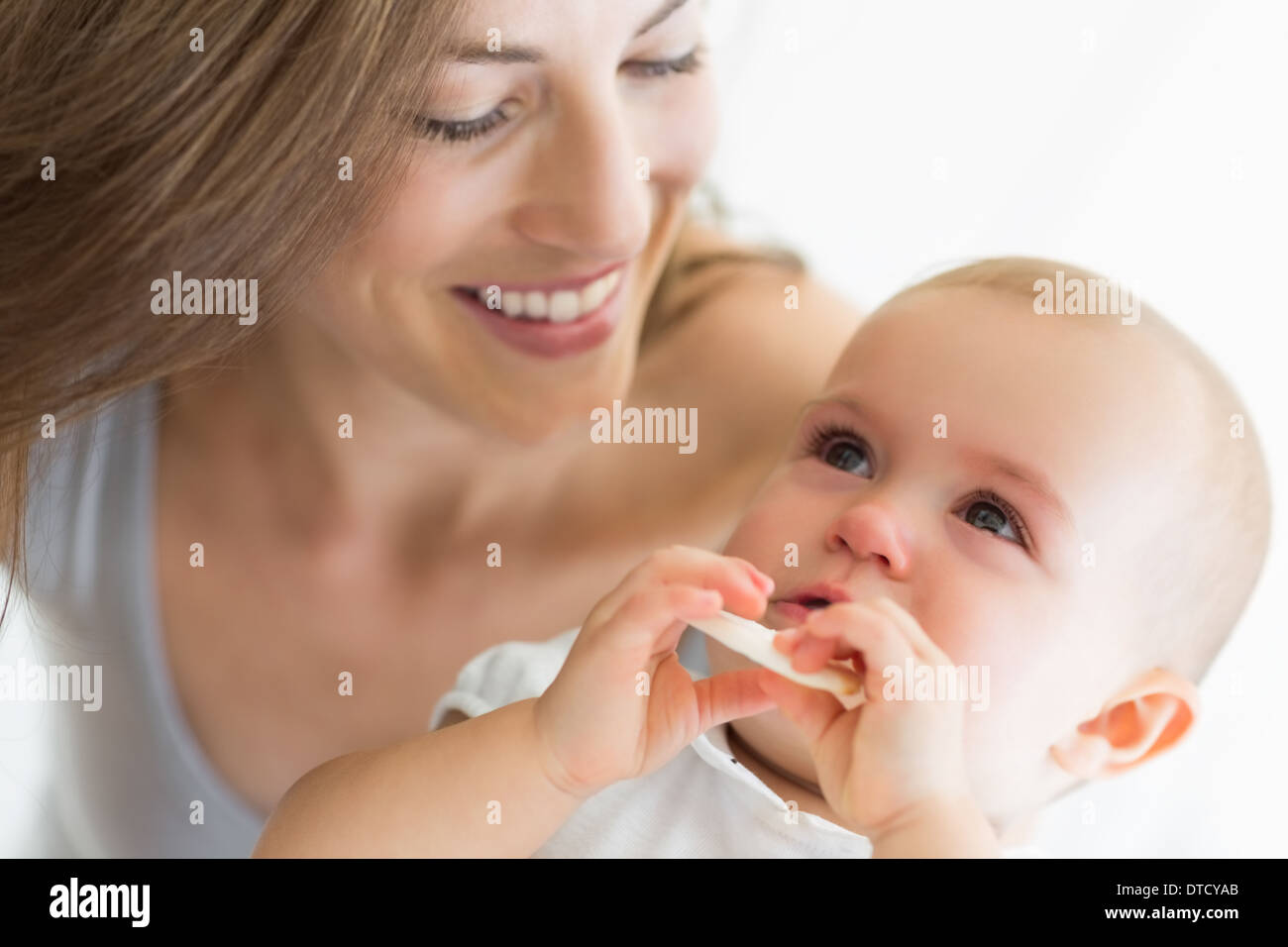Closeup of smiling mother and baby Stock Photo