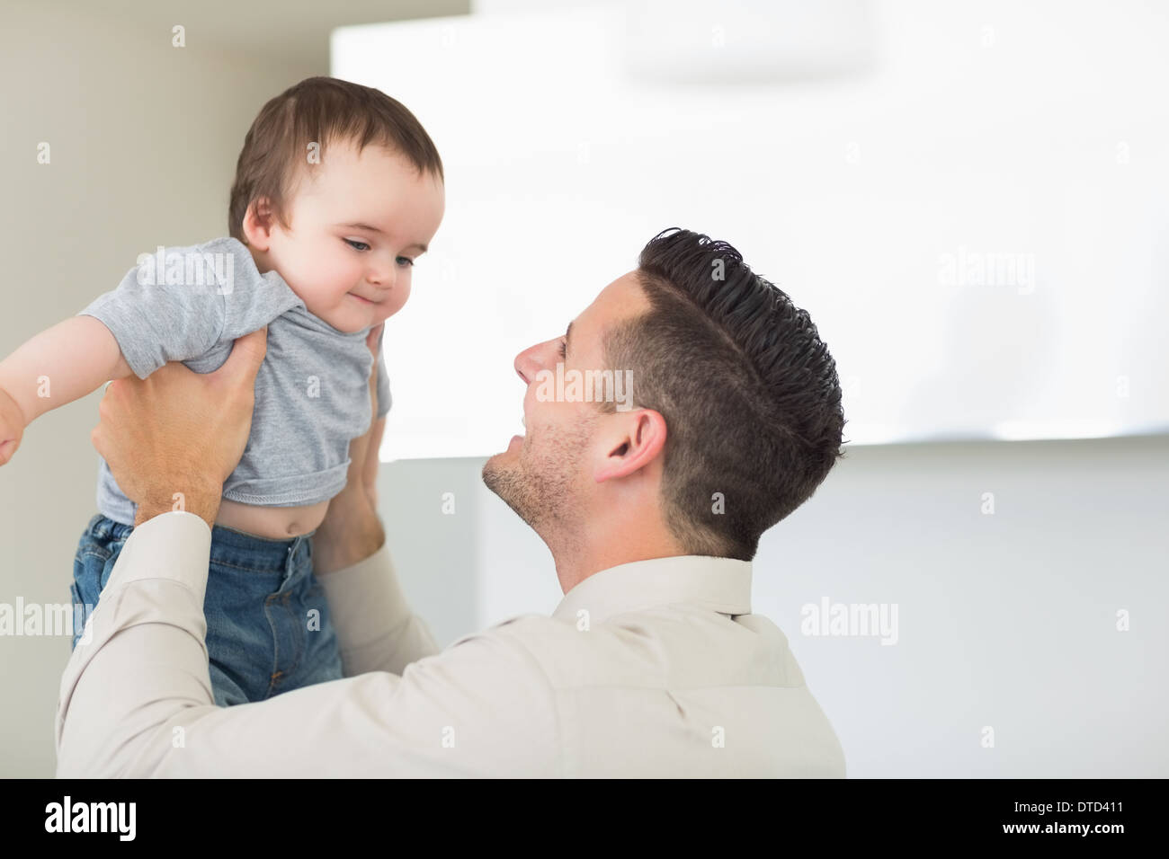 Father playing with cute baby Stock Photo