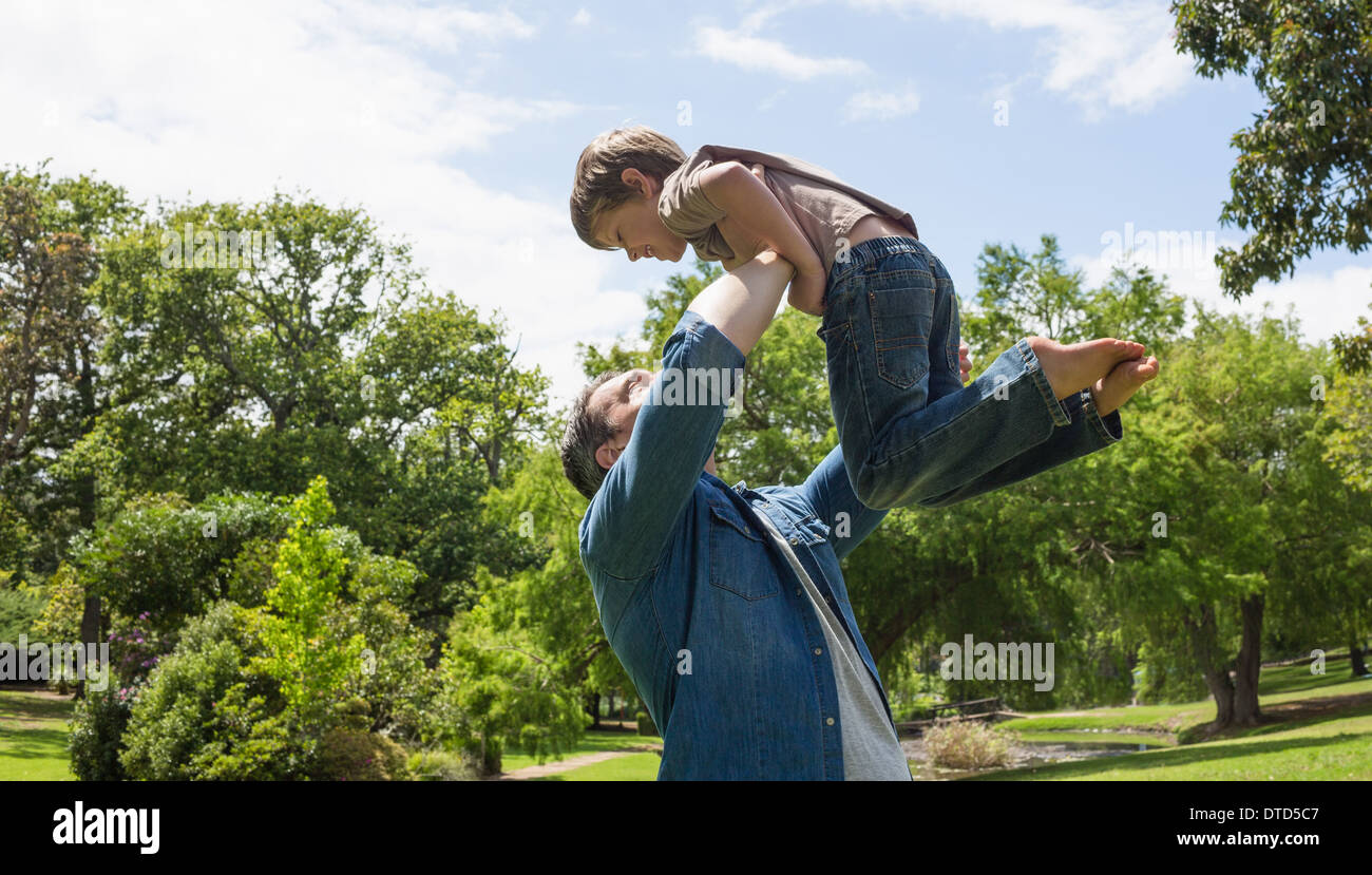 Happy playful father son garden hi-res stock photography and images - Alamy