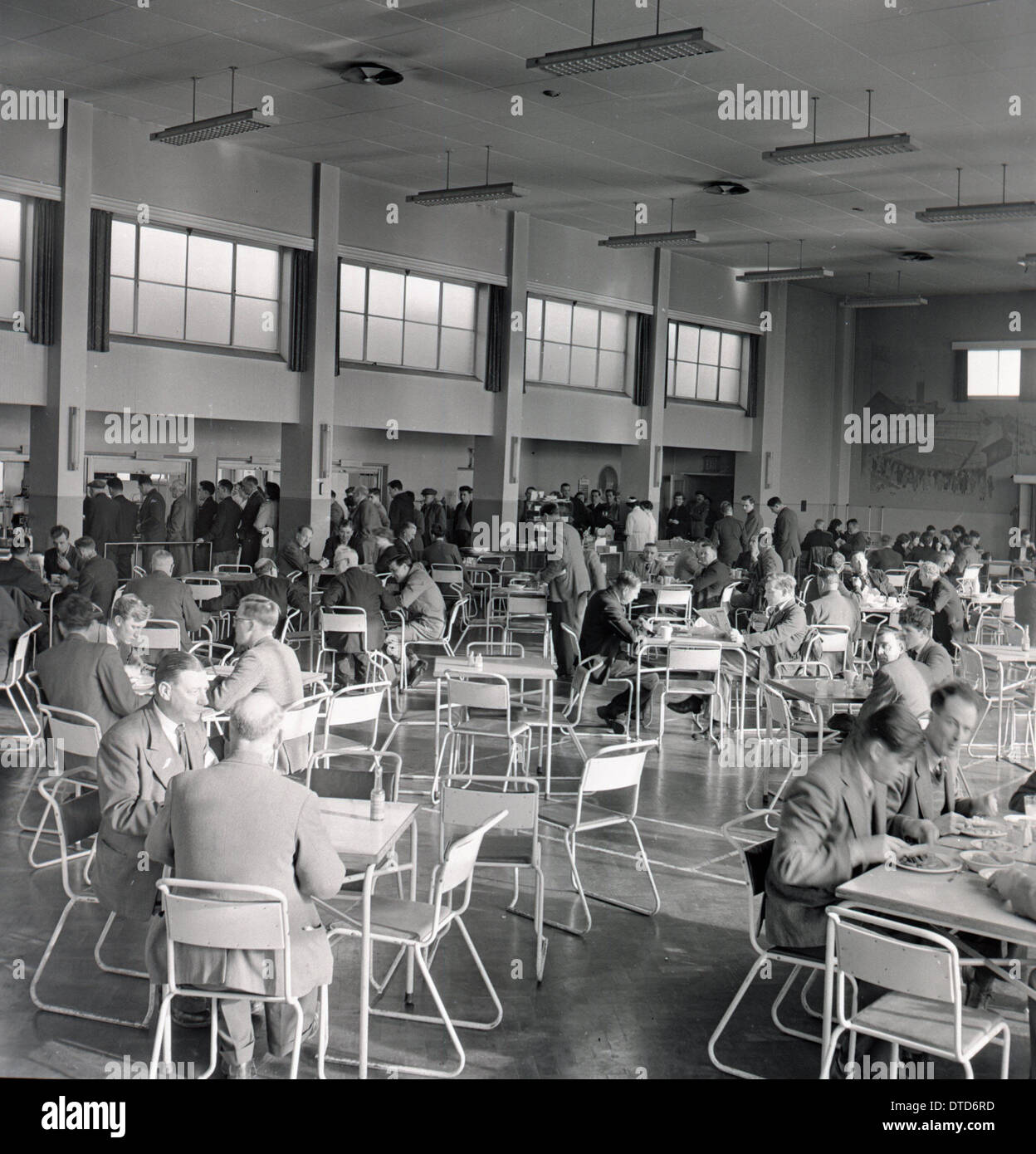 Historical image,1960s. Staff canteen or restaurant showing people