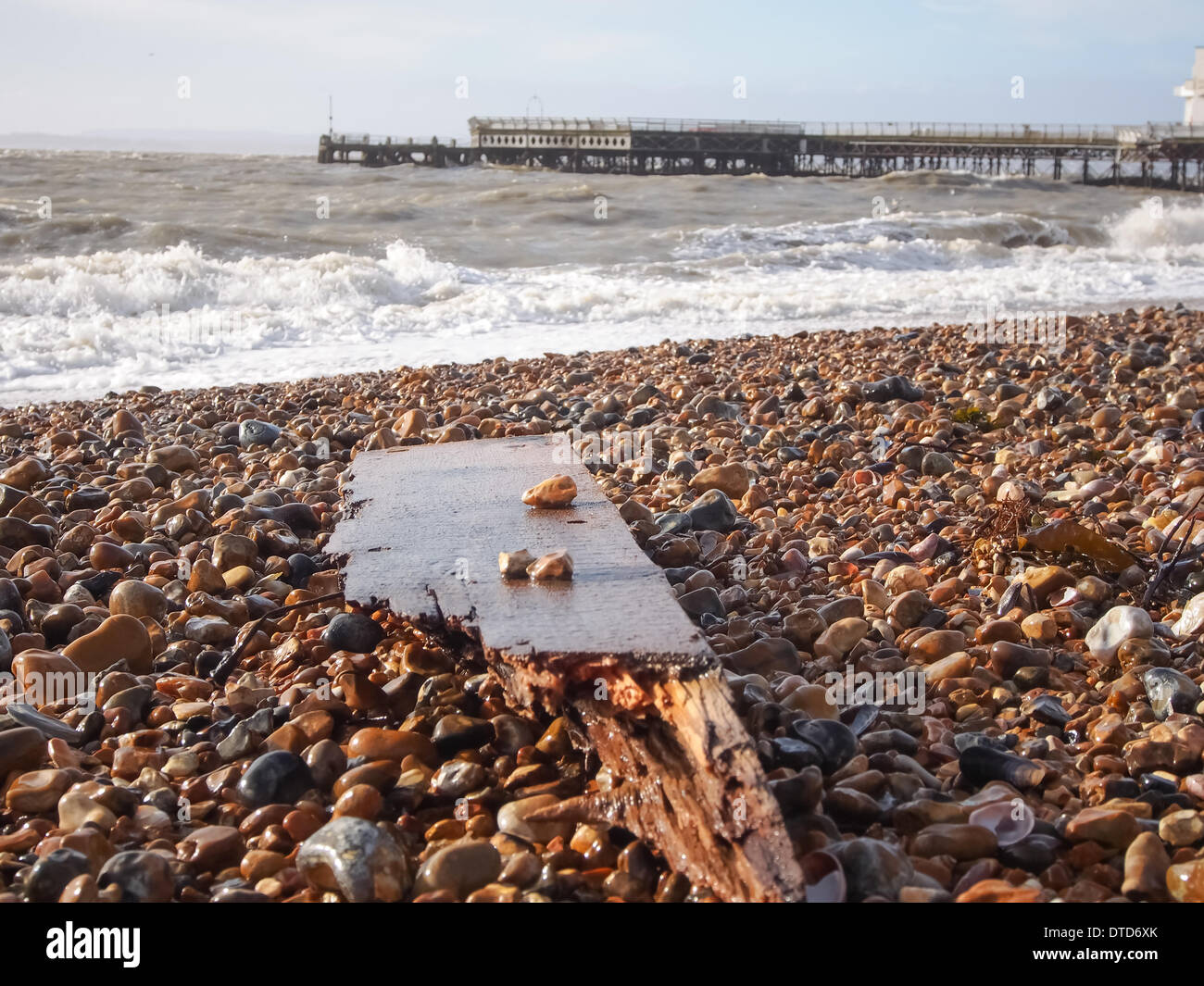 Portsmouth, Hampshire, England 15th February 2014Wood from the Damaged south Parade Pier lies along the beach after high winds and strong tides battered the pier overnight causing further structural damage. the pier has been closed to the public due to structural safety issues for over a year Credit:  simon evans/Alamy Live News Stock Photo