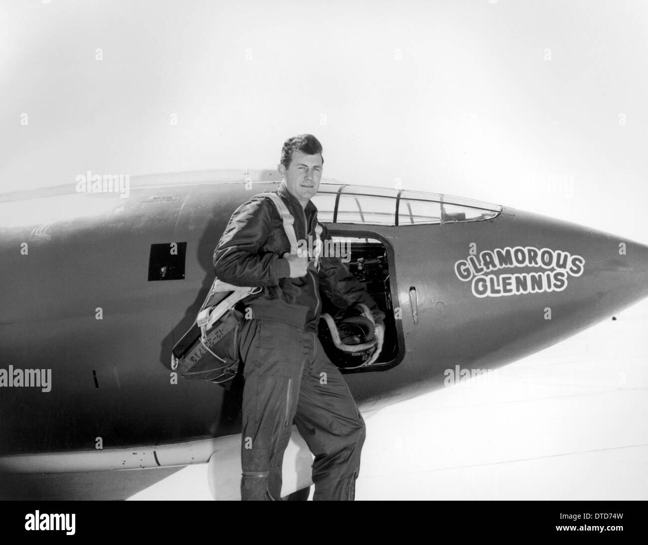 US Air Force test pilot Chuck Yeager standing in front of Glamorous Glennis the Bell X-1 aircraft that broke the sound barrier 1947 in Palmdale, California. Stock Photo