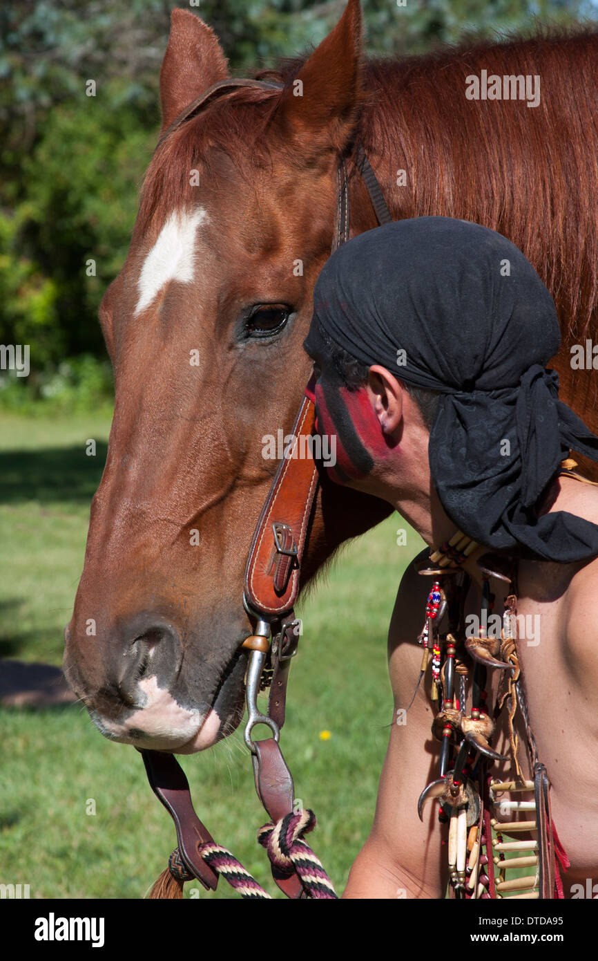 A Native American Indian man with his horse Stock Photo - Alamy