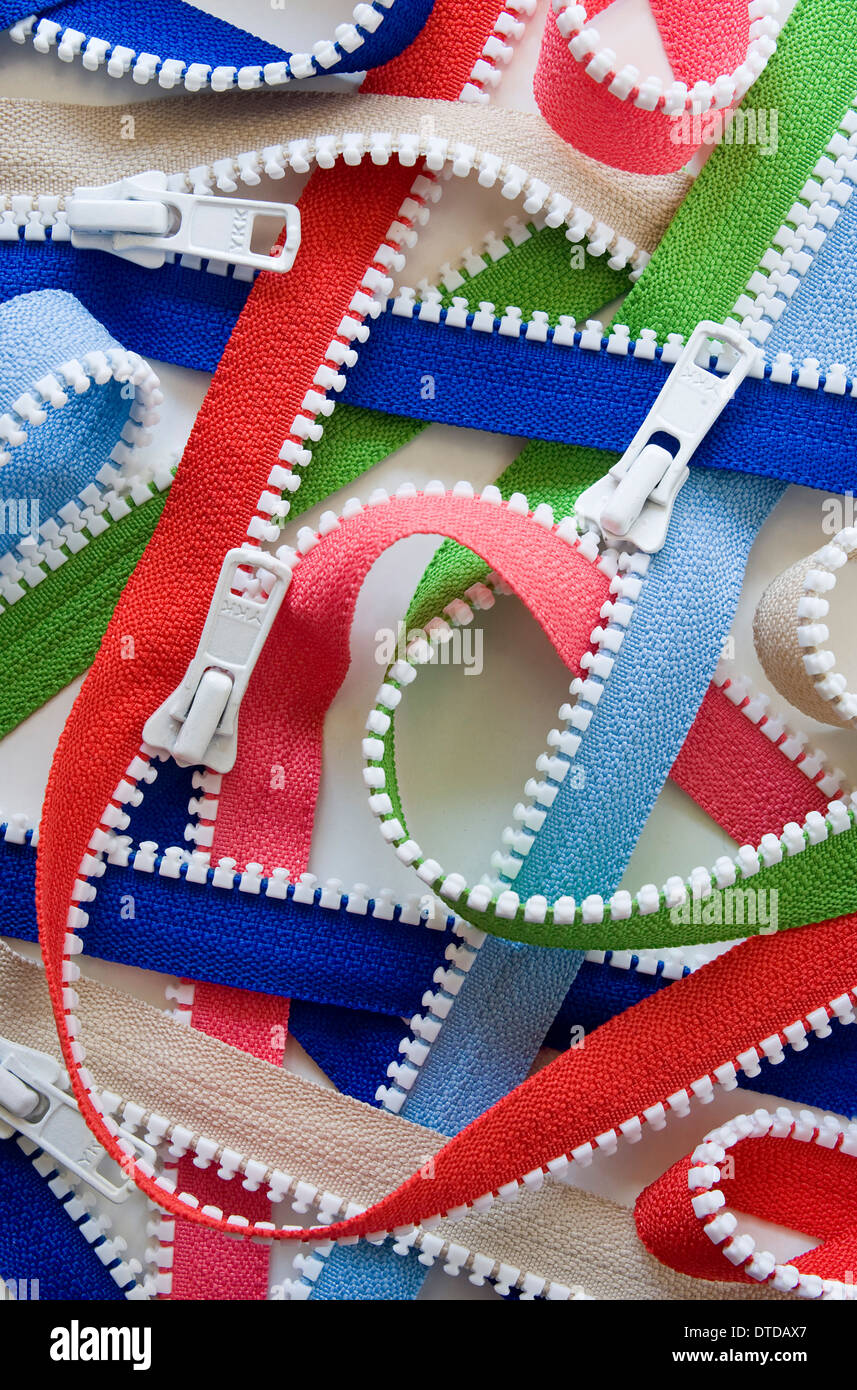 coloured double slide zippers Stock Photo Alamy