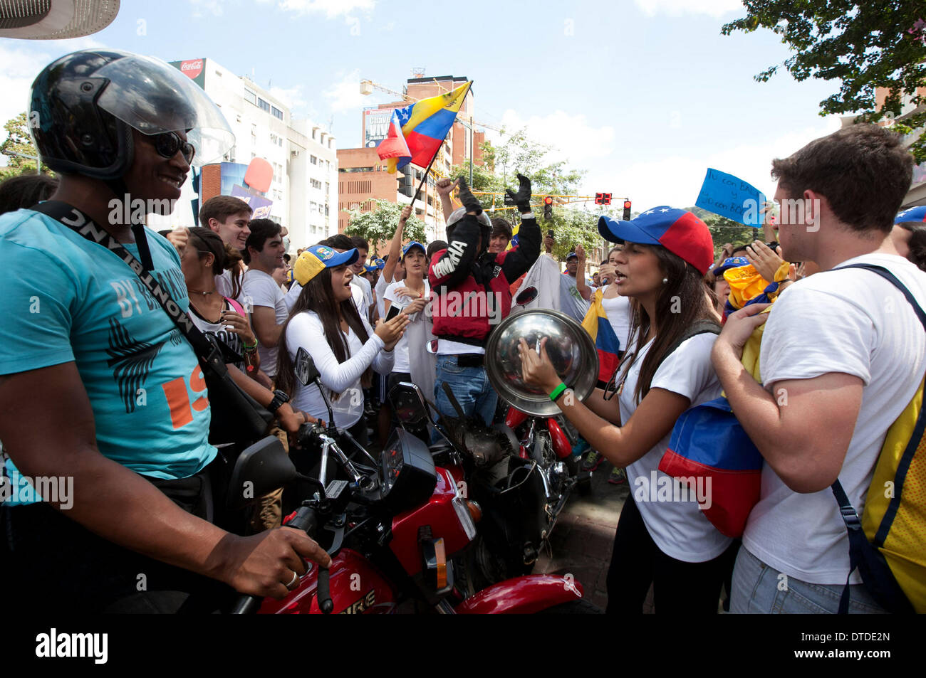 Caracas, Venezuela. 15th Feb, 2014. Oppositions gather to protest against recent political violence that killed three at Alfredo Sadel de Las Mercedes Square in Caracas, Venezuela, on Feb. 15, 2014. Demonstrators supporting the government also gathered on Saturday to participate in the 'March for Peace' called by Venezuelan President Nicolas Maduro. Credit:  Boris Vergara/Xinhua/Alamy Live News Stock Photo