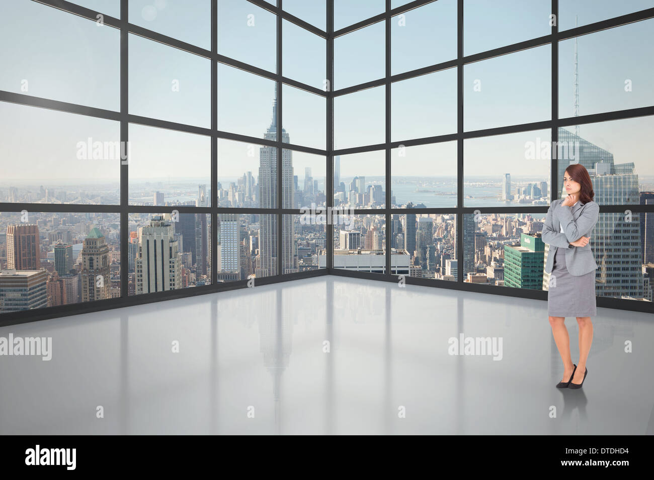 Composite image of focused businesswoman Stock Photo