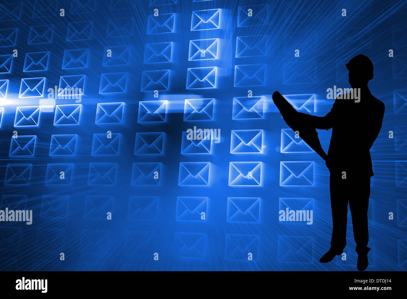 Composite image of glowing envelopes on blue background Stock Photo