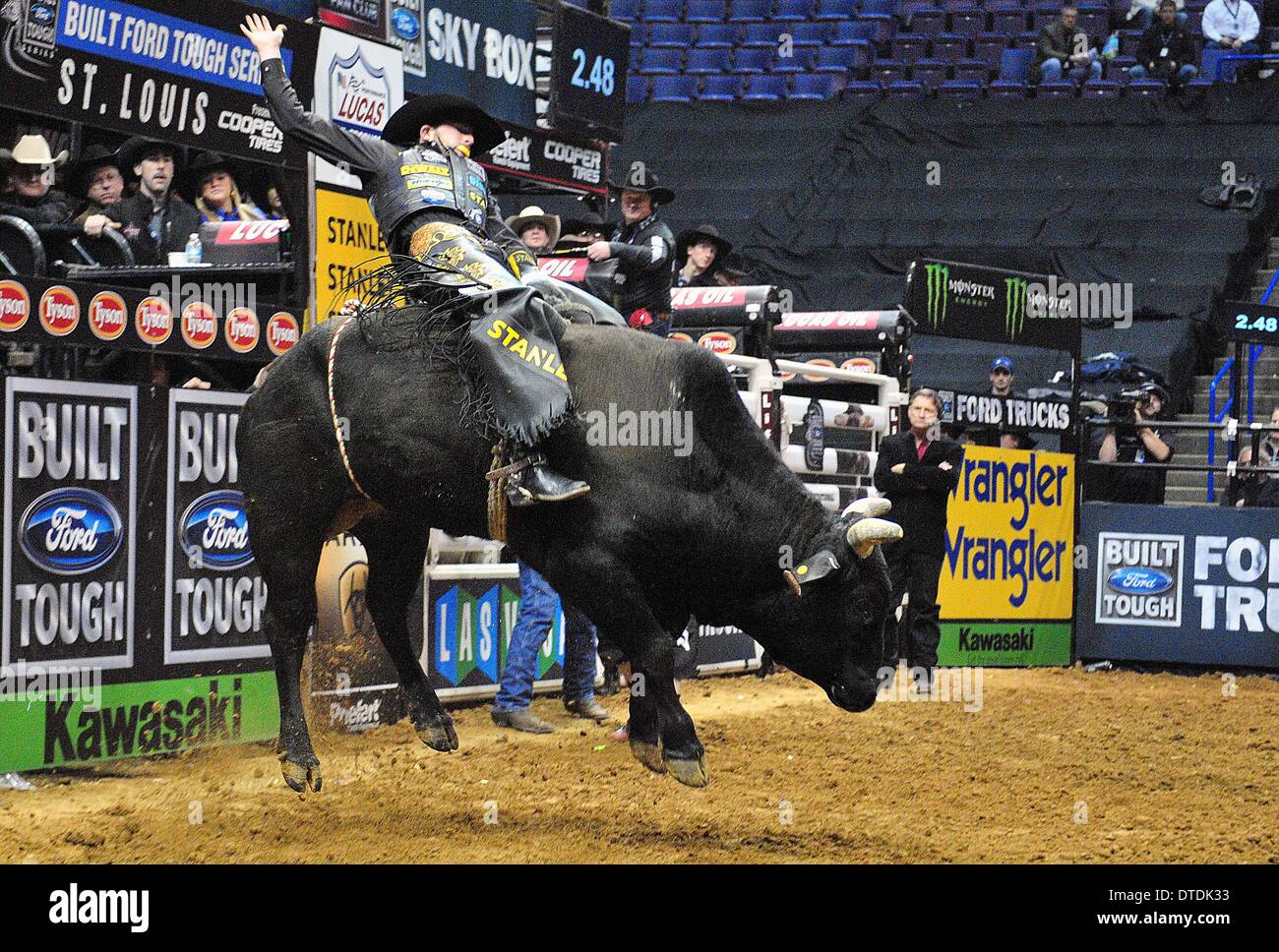 St. Louis, Missouri, USA. 15th Feb, 2014. February 14, 2014: Rider Douglas Duncan on bull My Kinda Party during the Professional Bullriders Built Ford Tough Series St. Louis Invitational at Scott Trade Center in St. Louis. Credit:  csm/Alamy Live News Stock Photo