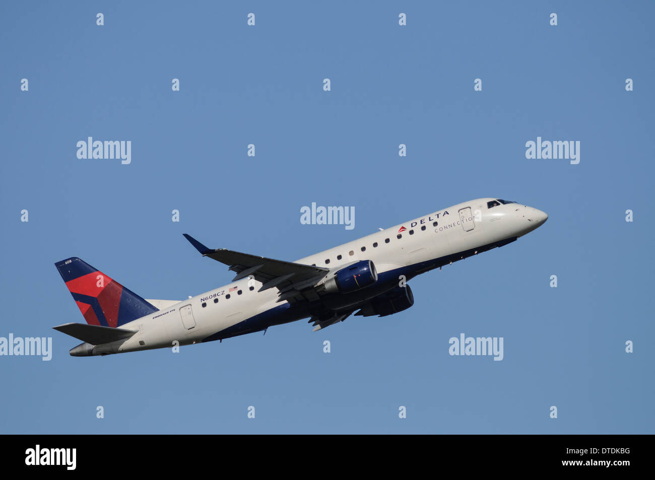 Operated by Compass Airlines, an Embraer 175 regional airliner in Delta Connection livery takes off from Vancouver International Stock Photo