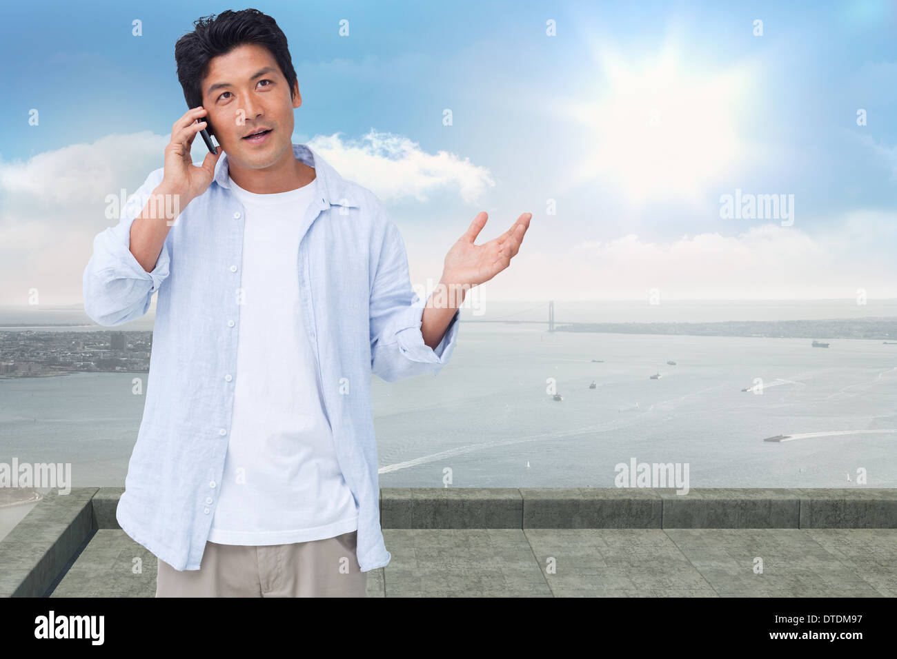 Composite image of clueless male on his cellphone Stock Photo Alamy