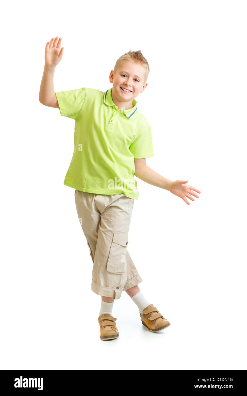 Handsome kid boy balancing or dancing on white background Stock Photo