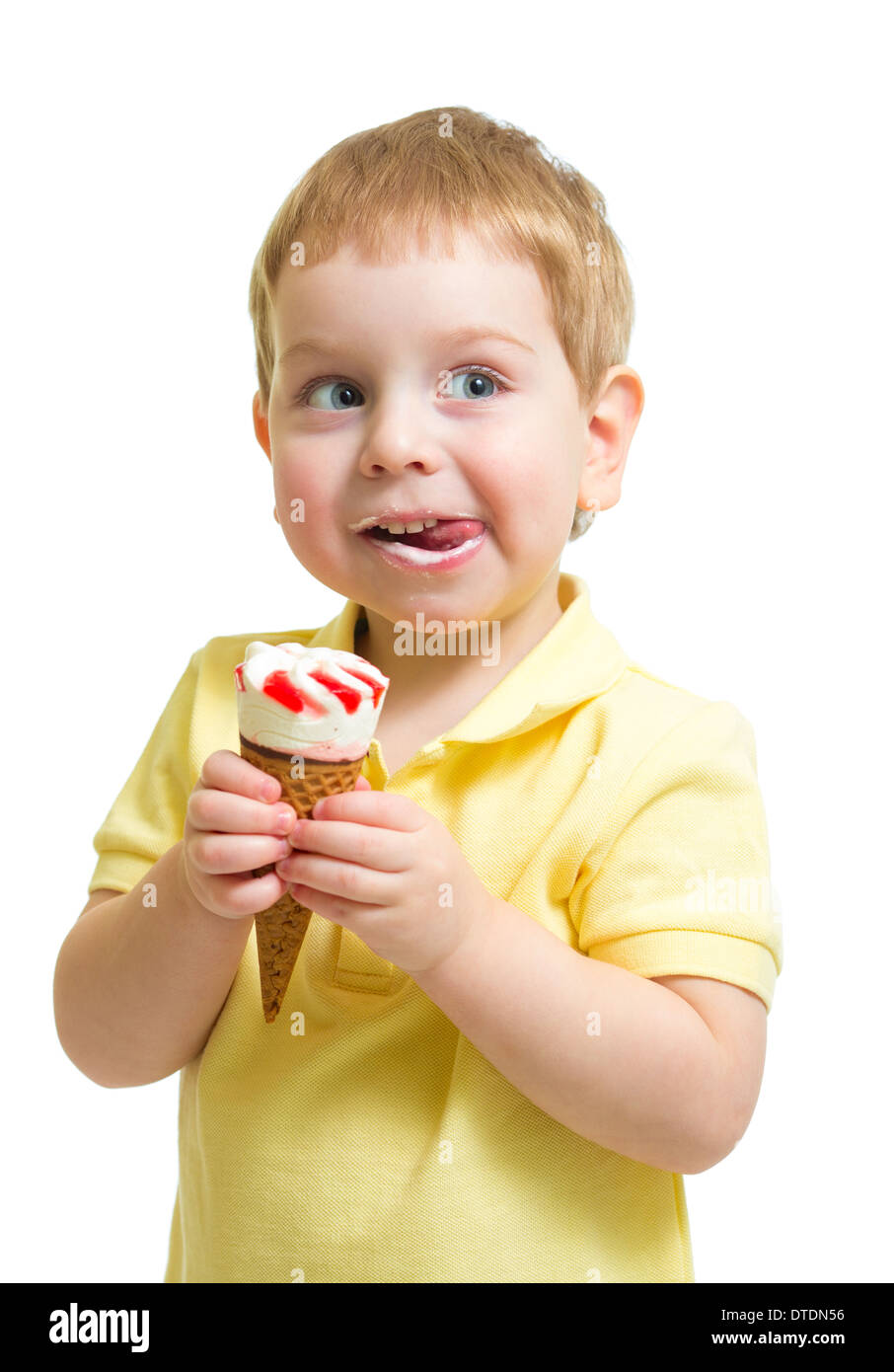 Boy eating ice cream or icecream isolated on white Stock Photo