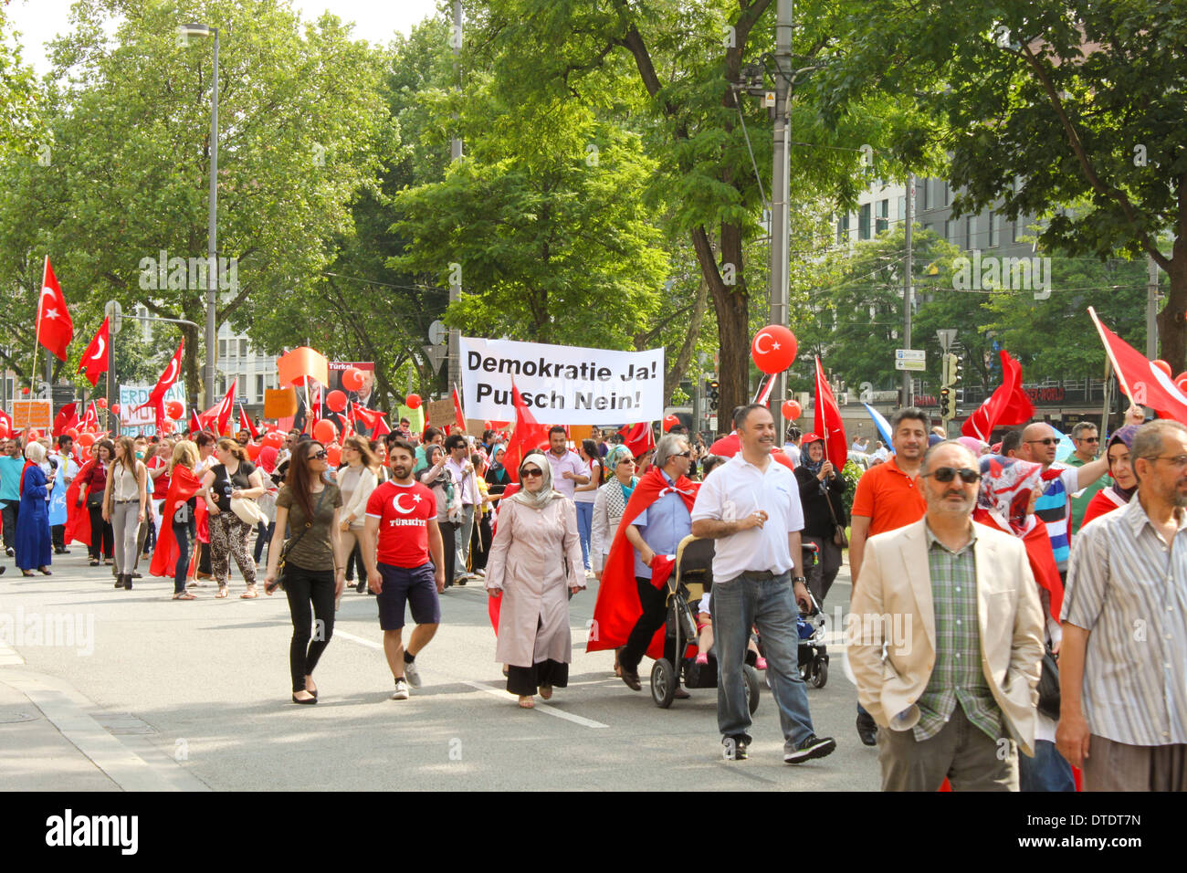 MUNICH, GERMANY - JULY 6, 2013: People of turkish origin came out to support Prime Minister of Turkey Recep Tayyip Erdogan. Stock Photo