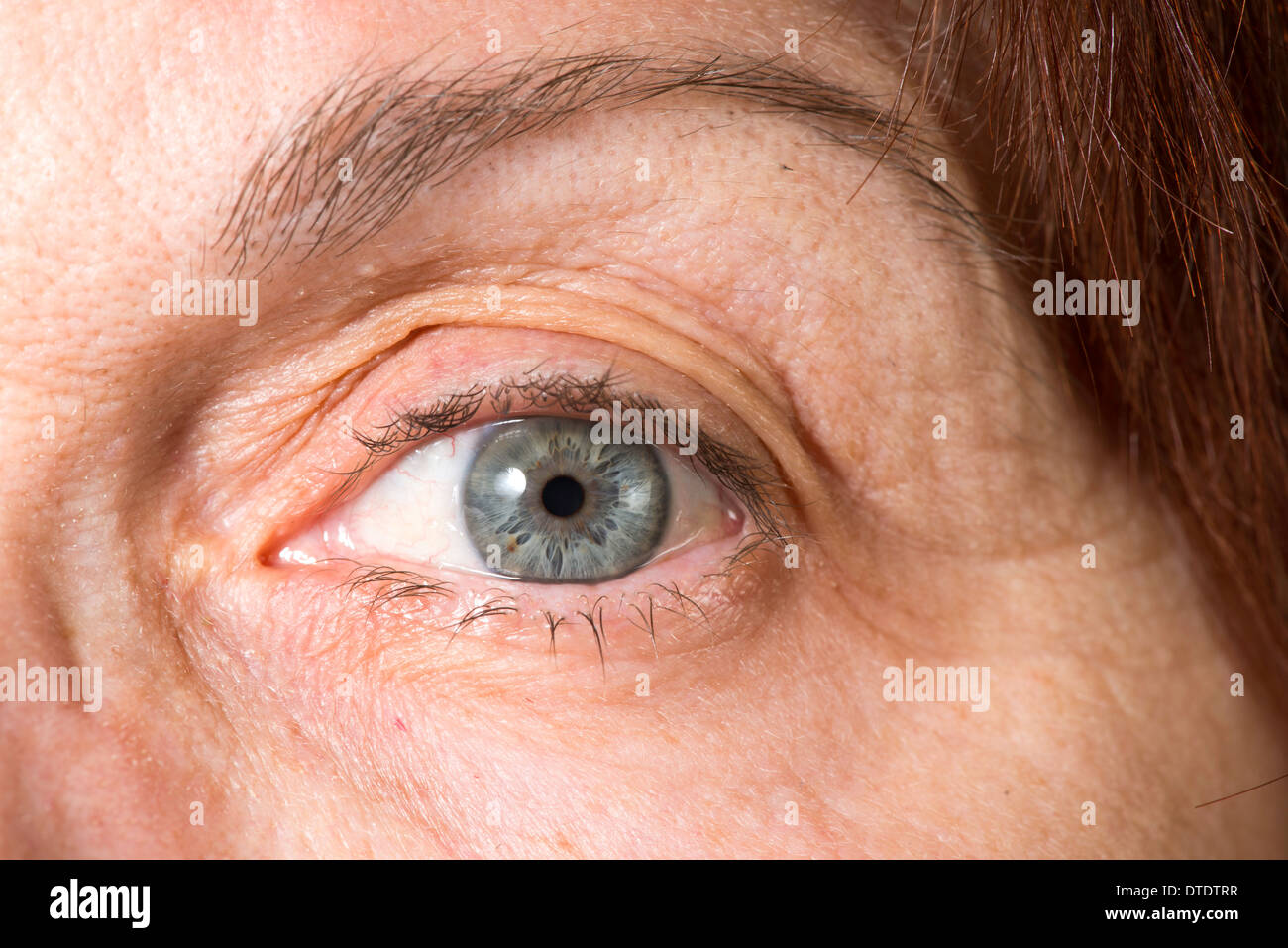 Close up old women blue eye Stock Photo