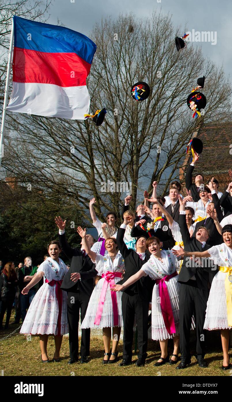 Drachhausen, Germany. 16th Feb, 2014. Unmarried couples in traditional Sorbian festive costumes attend the traditional Zapust of the Sorbian-Wendish youth carnival in Drachhausen, Germany, 16 February 2014. Zapust is the most popular tradition of the Sorbs. The carnival procession in the villages of Lusatia is held to expel the winter. Photo: Patrick Pleul/ZB/dpa/Alamy Live News Stock Photo