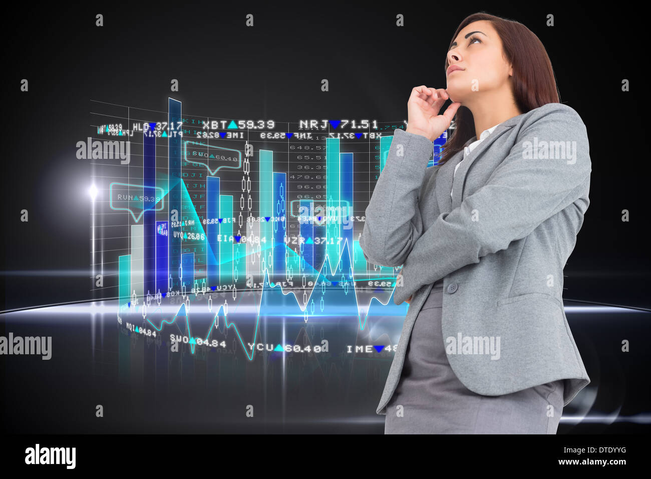 Composite image of focused businesswoman Stock Photo