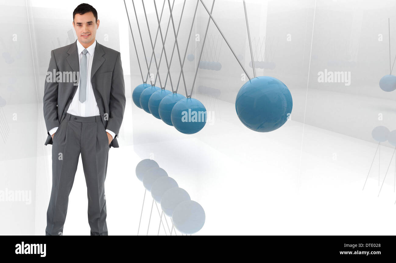 Composite image of businessman with his hands in his pockets Stock Photo