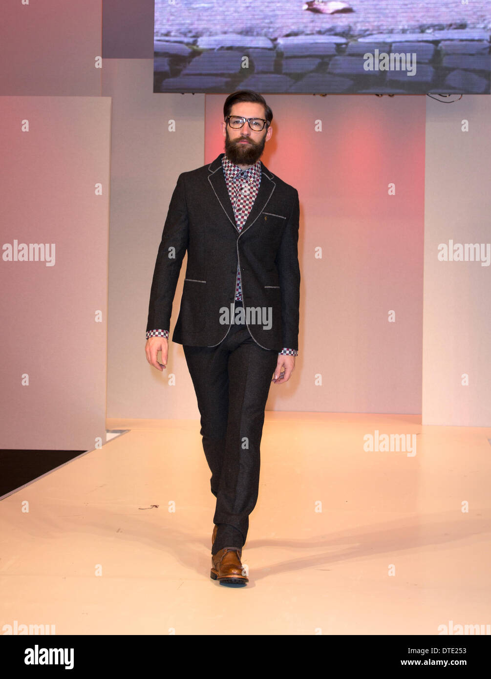 Male Models wearing Gabicci Vintage at the Moda Trade Fashion Show, boots  by Chatham Marine Stock Photo - Alamy