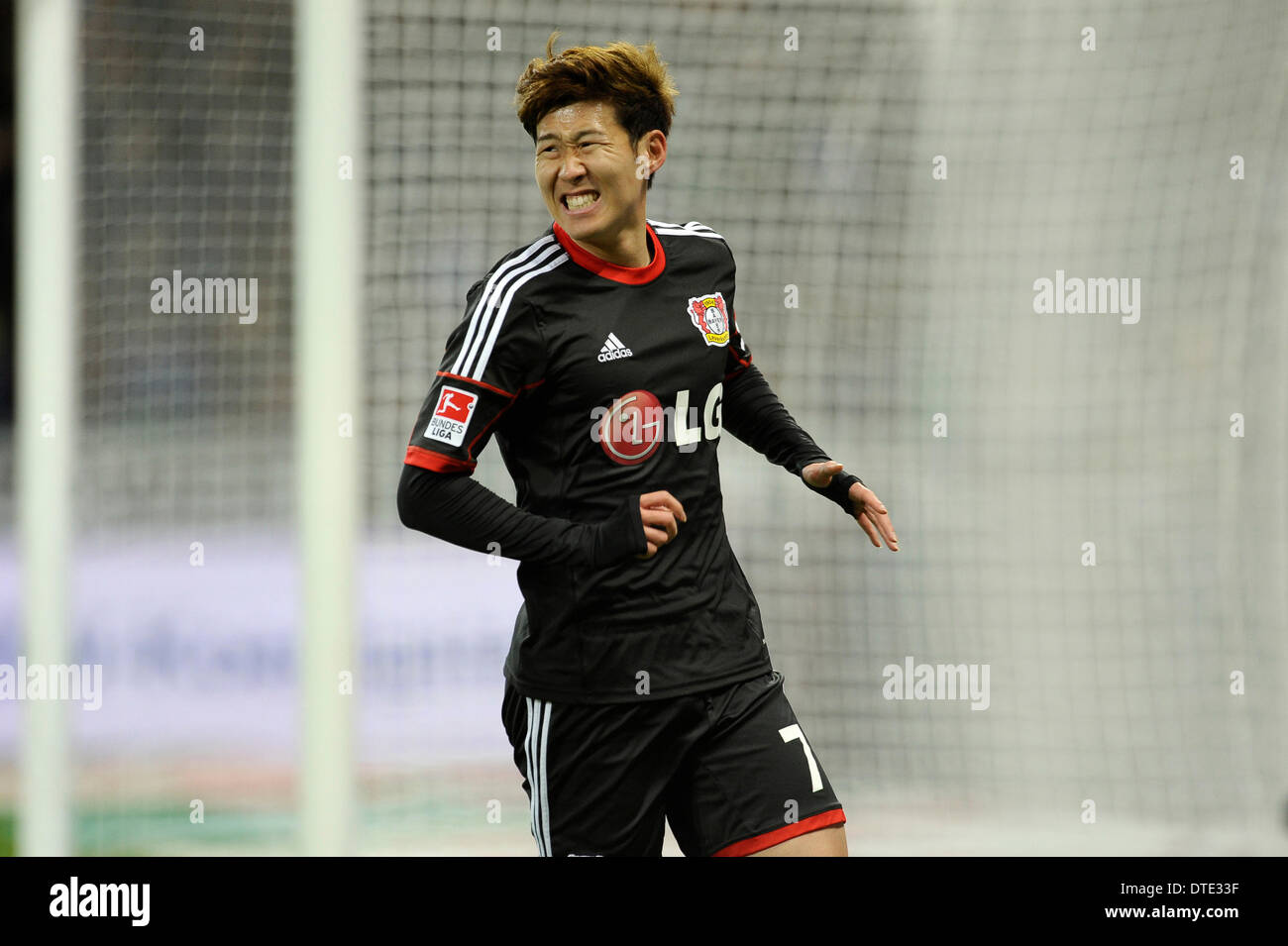 BayArena Leverkusen Germany ,15th February .2014, Football Bundesliga  Season 2013/14, matchday 21, Bayer 04 Leverkusen - Schalke 04 1:2 ---  Klaas-Jan Huntelaar (S04) shows his teeth, Leverkusens Simon Rolfes, Stefan  Kie§ling (Kiessling)