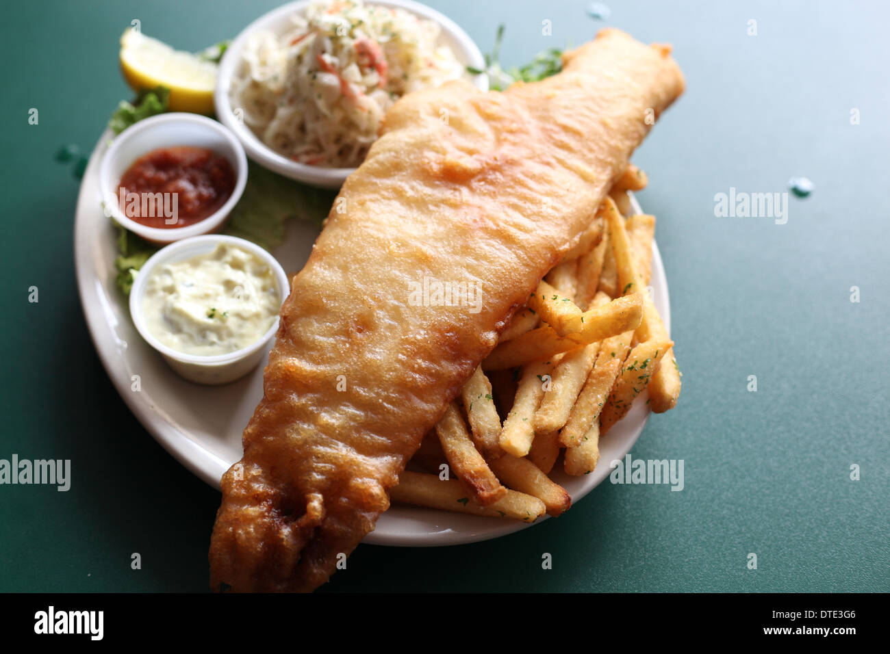 Fish & Chips with a pint of stout beer Stock Photo