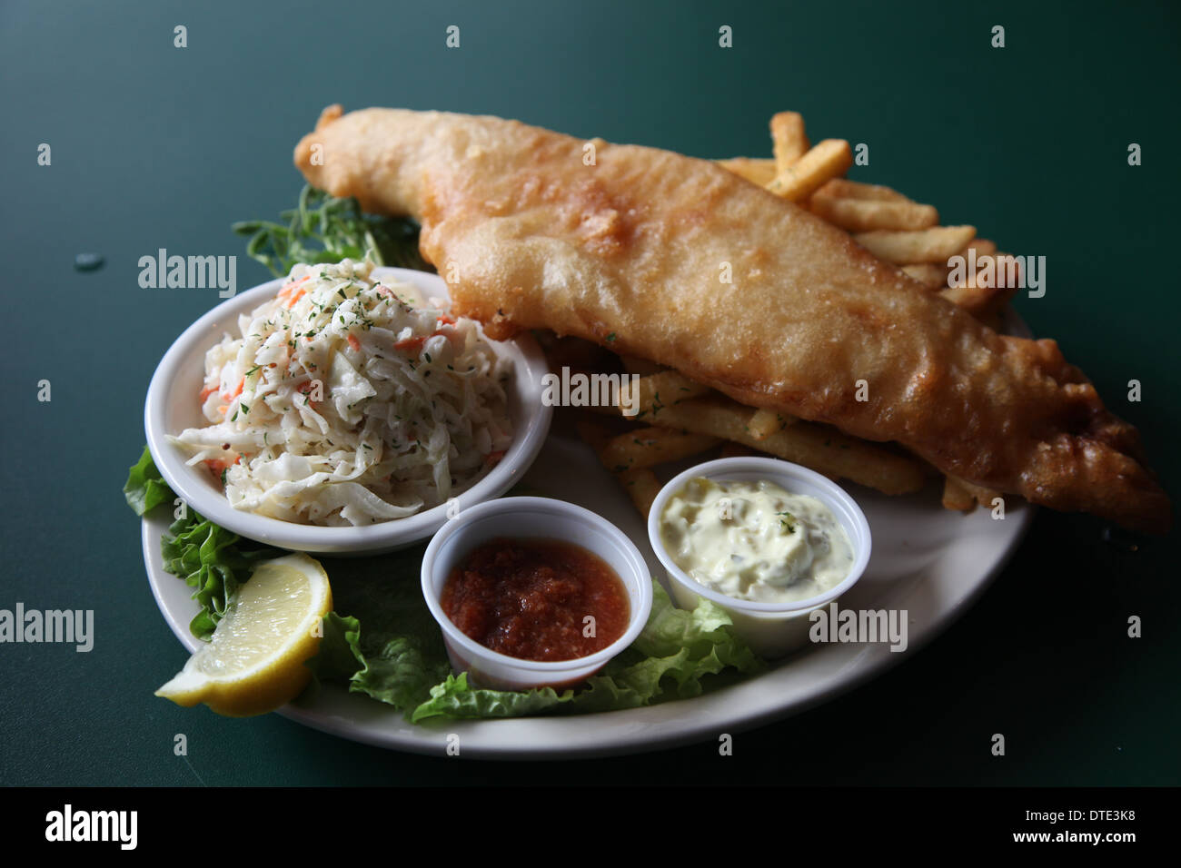 Fish & Chips with a pint of stout beer Stock Photo
