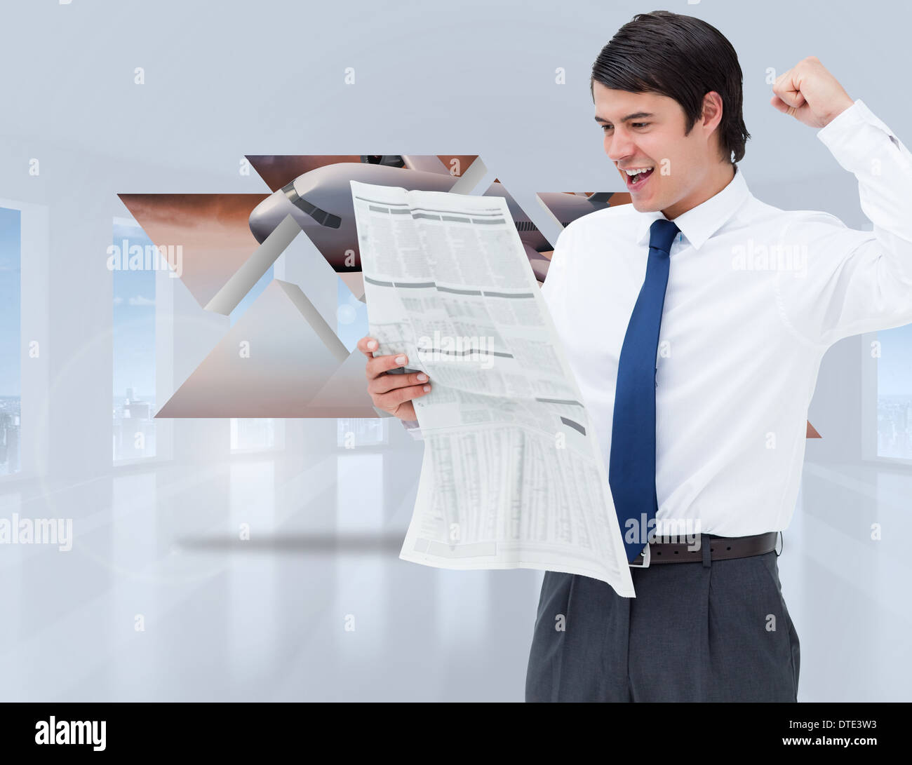 Composite image of celebrating tradesman looking at the news Stock Photo