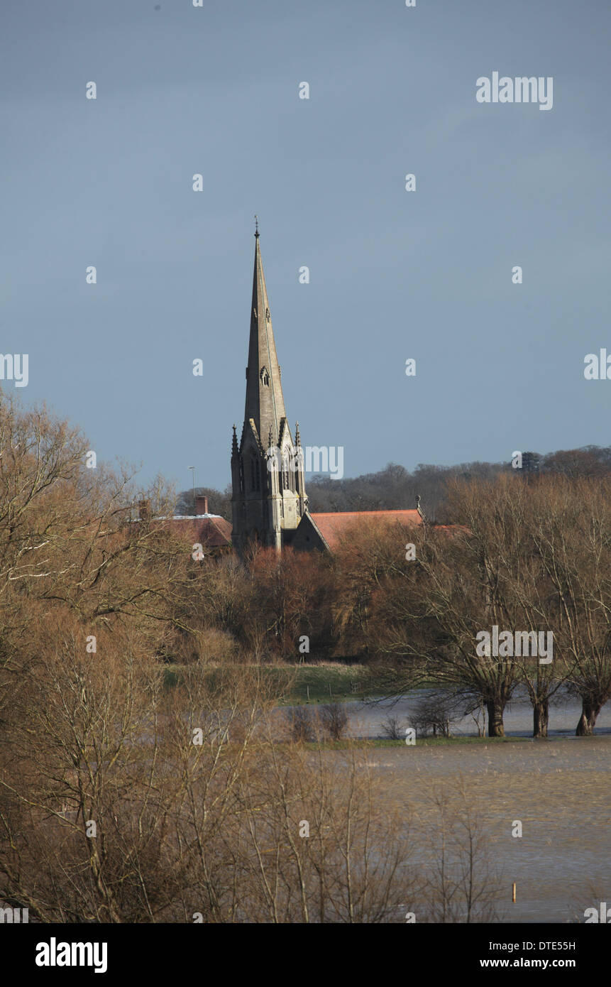 Sherbourne Church, Warwickshire viewed across the flood plain of the River Avon Stock Photo