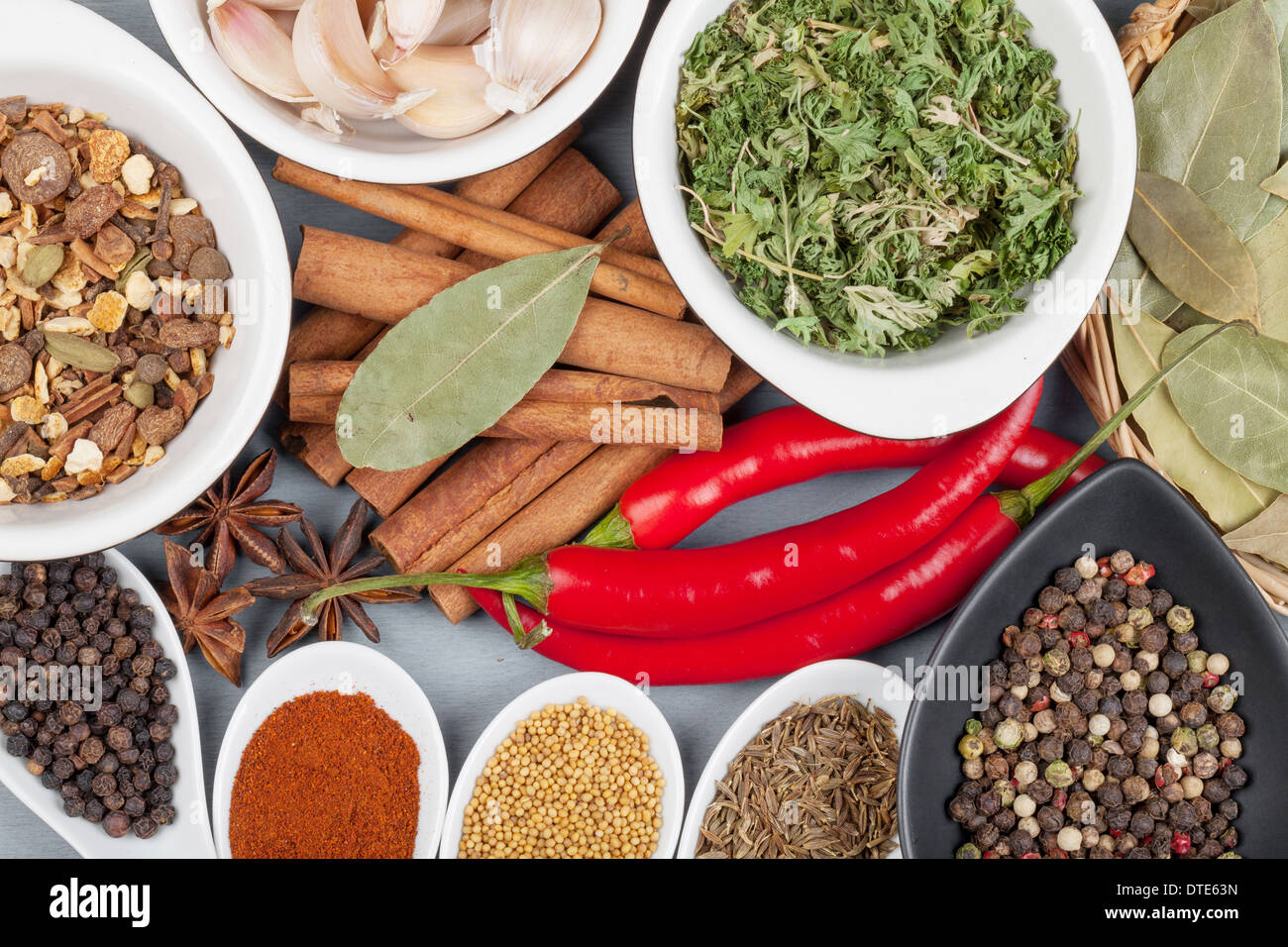 Herbs and spices on wood table background Stock Photo