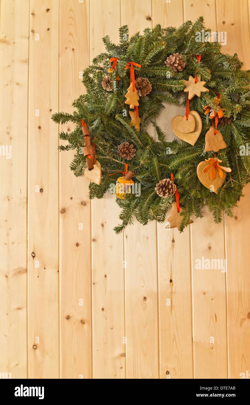 The Christmas wreath on wooden wall in USA Stock Photo