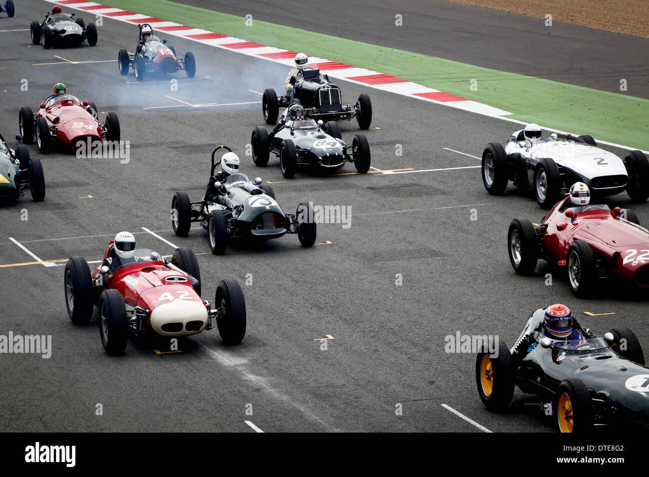 Vintahe or classic single seat open wheel racers on the starting grid ...