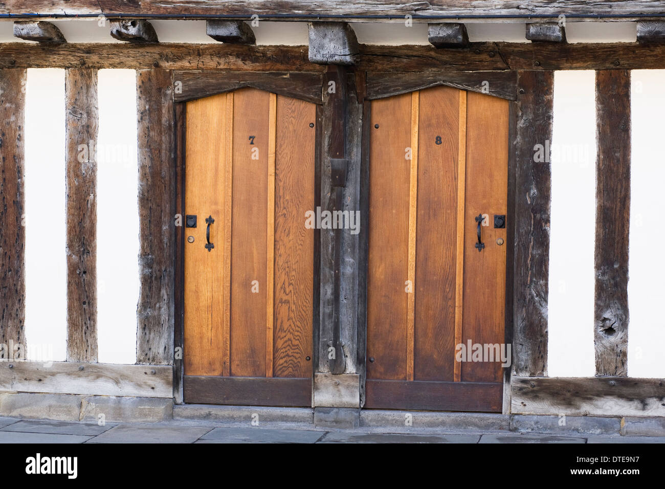 Two doors to the almshouses, Church Street, Stratford-upon-Avon, Warwickshire. UK Stock Photo