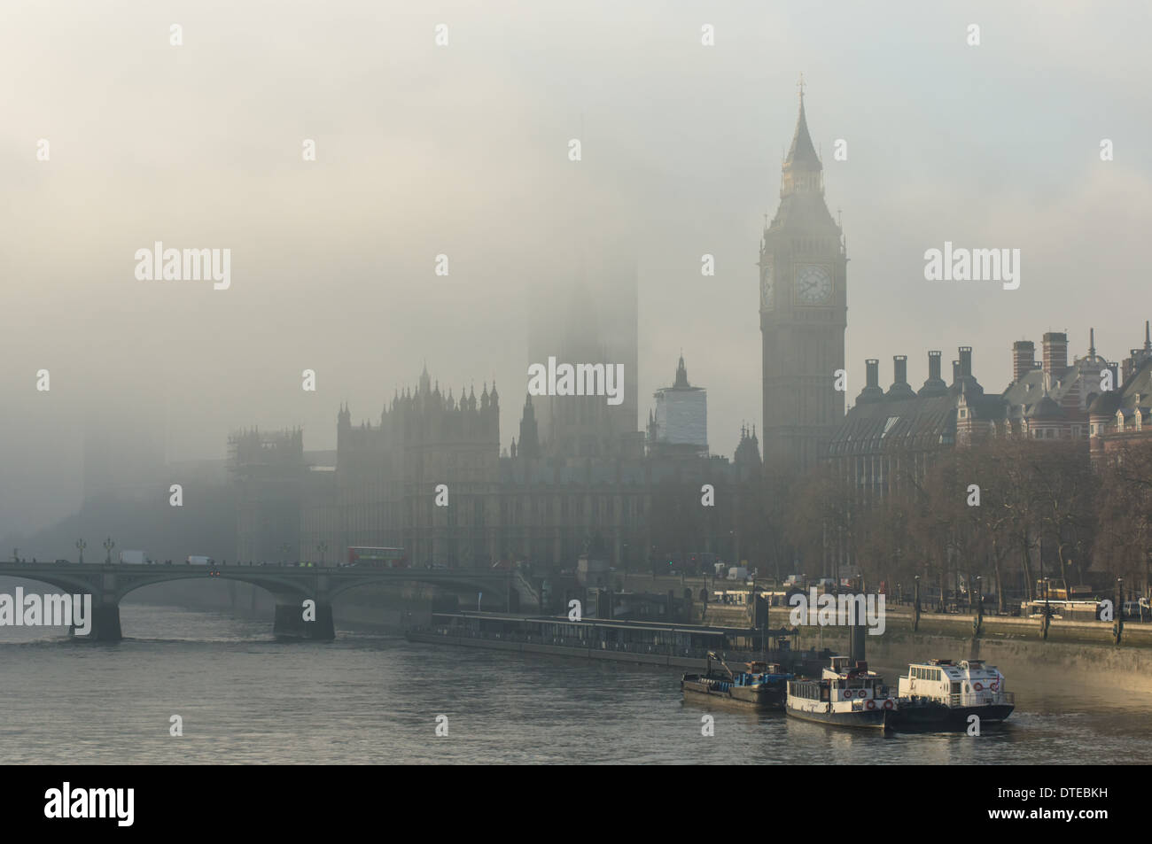 London fog, Big Ben and the Houses of Parliament on a foggy morning, London England United Kingdom UK Stock Photo