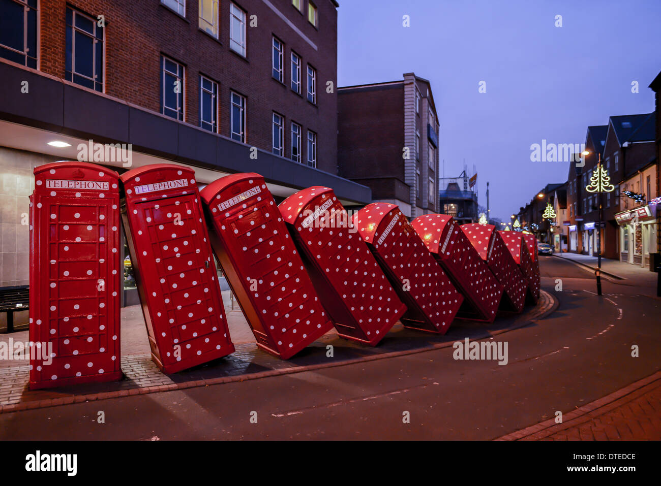 British UK Phone Boxes Falling Over Art Installation Stock Photo