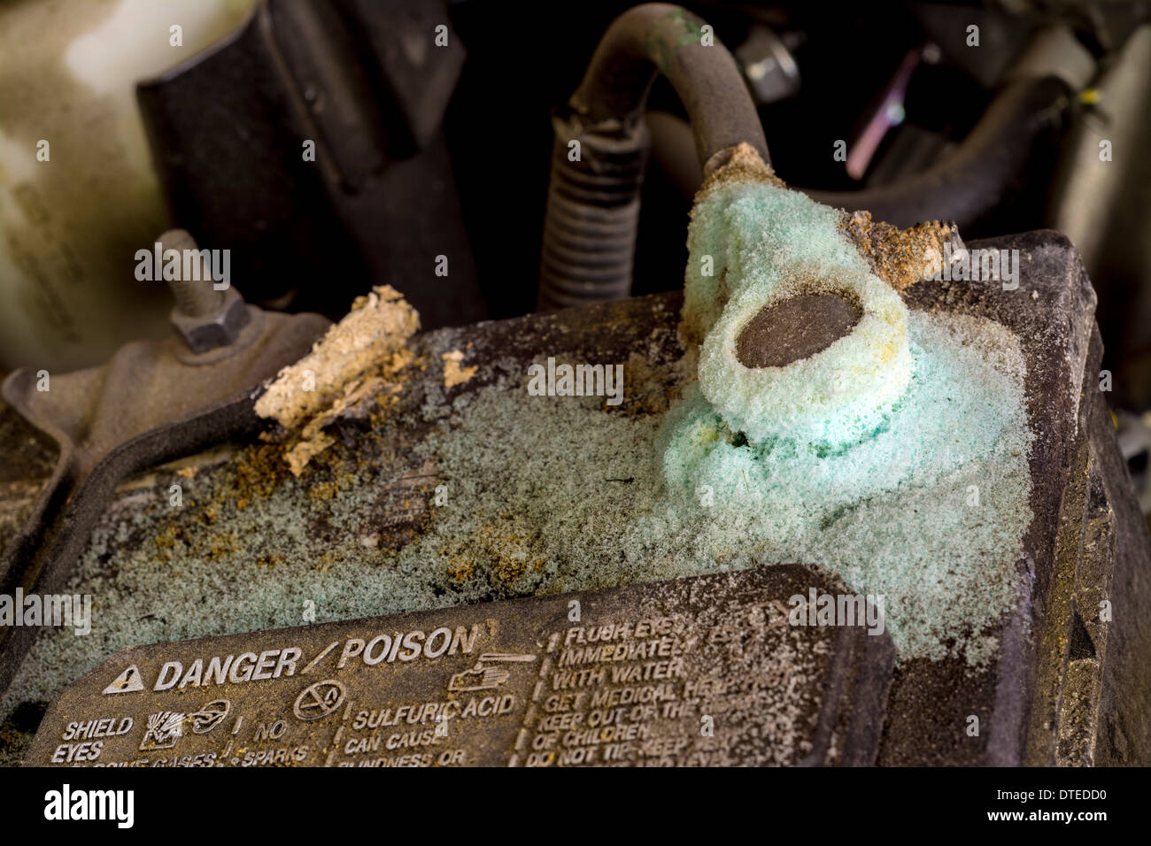 Automobile Battery terminal with acid and warning lable Stock Photo Alamy