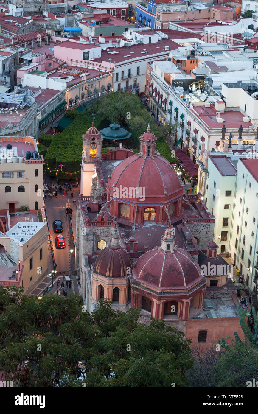 Overview of San Diego Church and Union Garden Park at dusk - Guanajuato, Guanajuato, Mexico Stock Photo