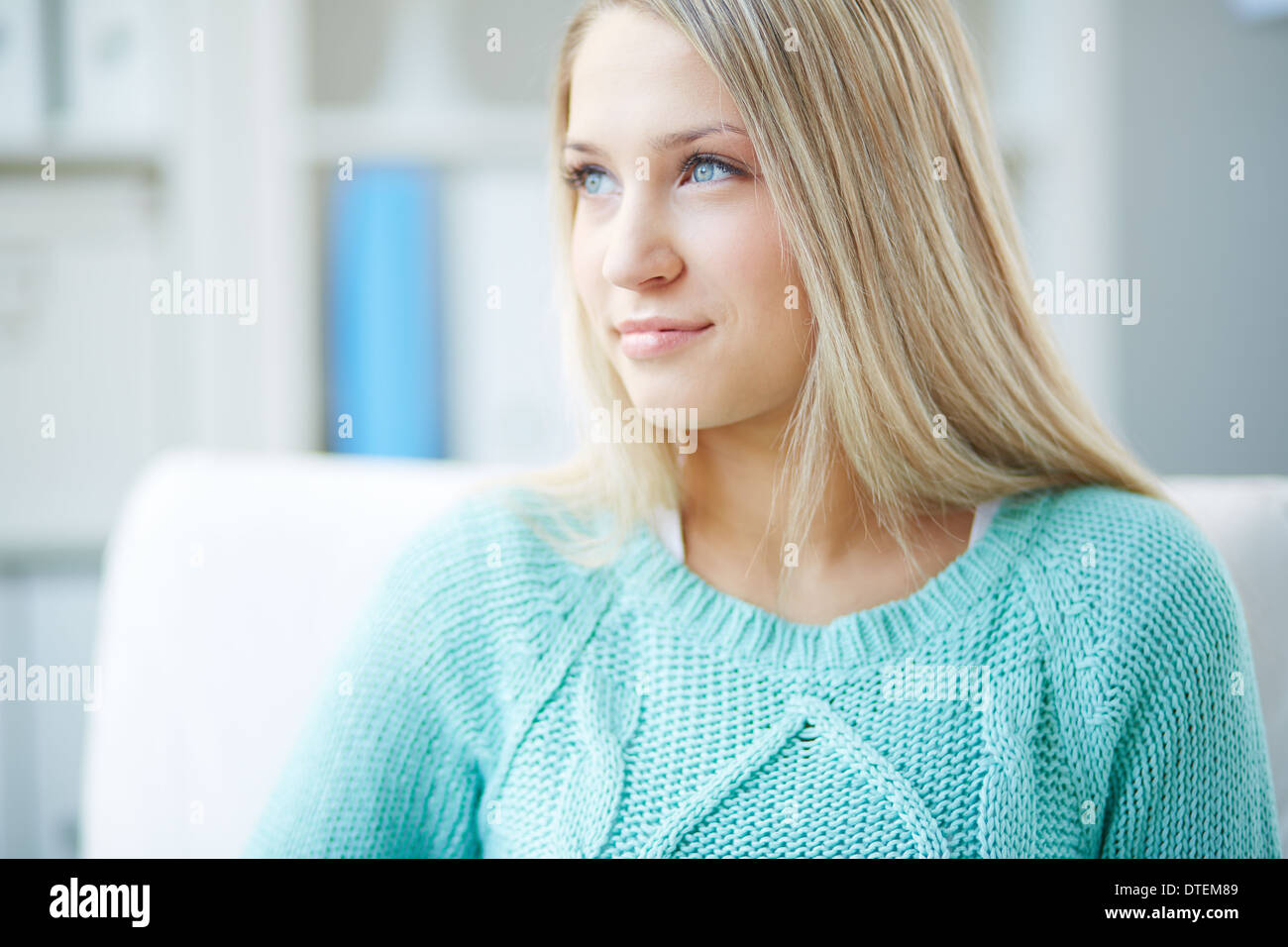 Pretty girl looking pensively away Stock Photo