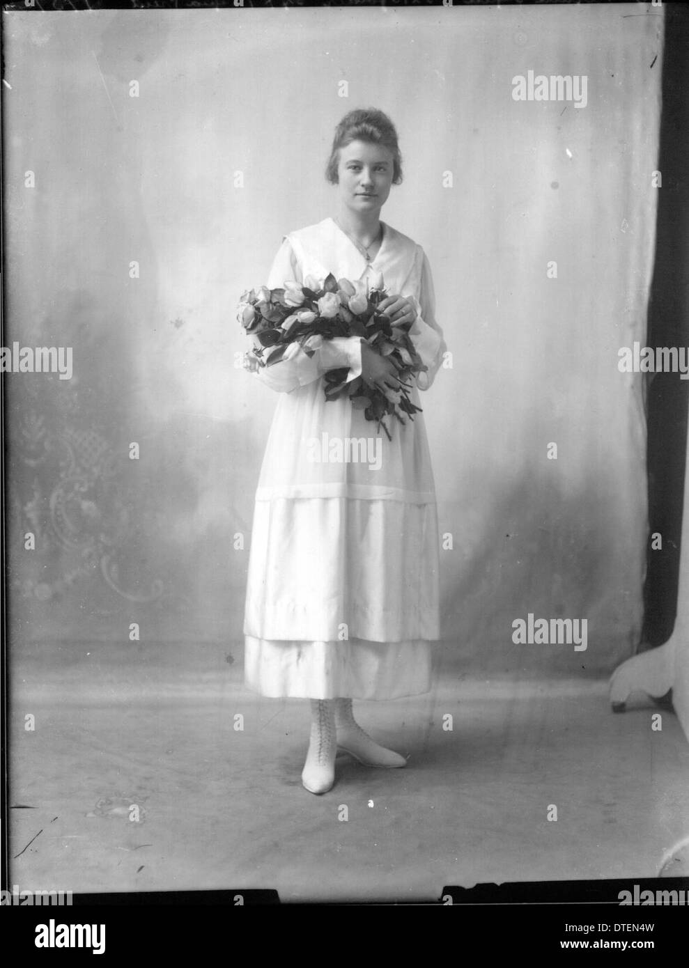 A Portrait Photograph Of Bessie White From 1918 Featuring A Woman With