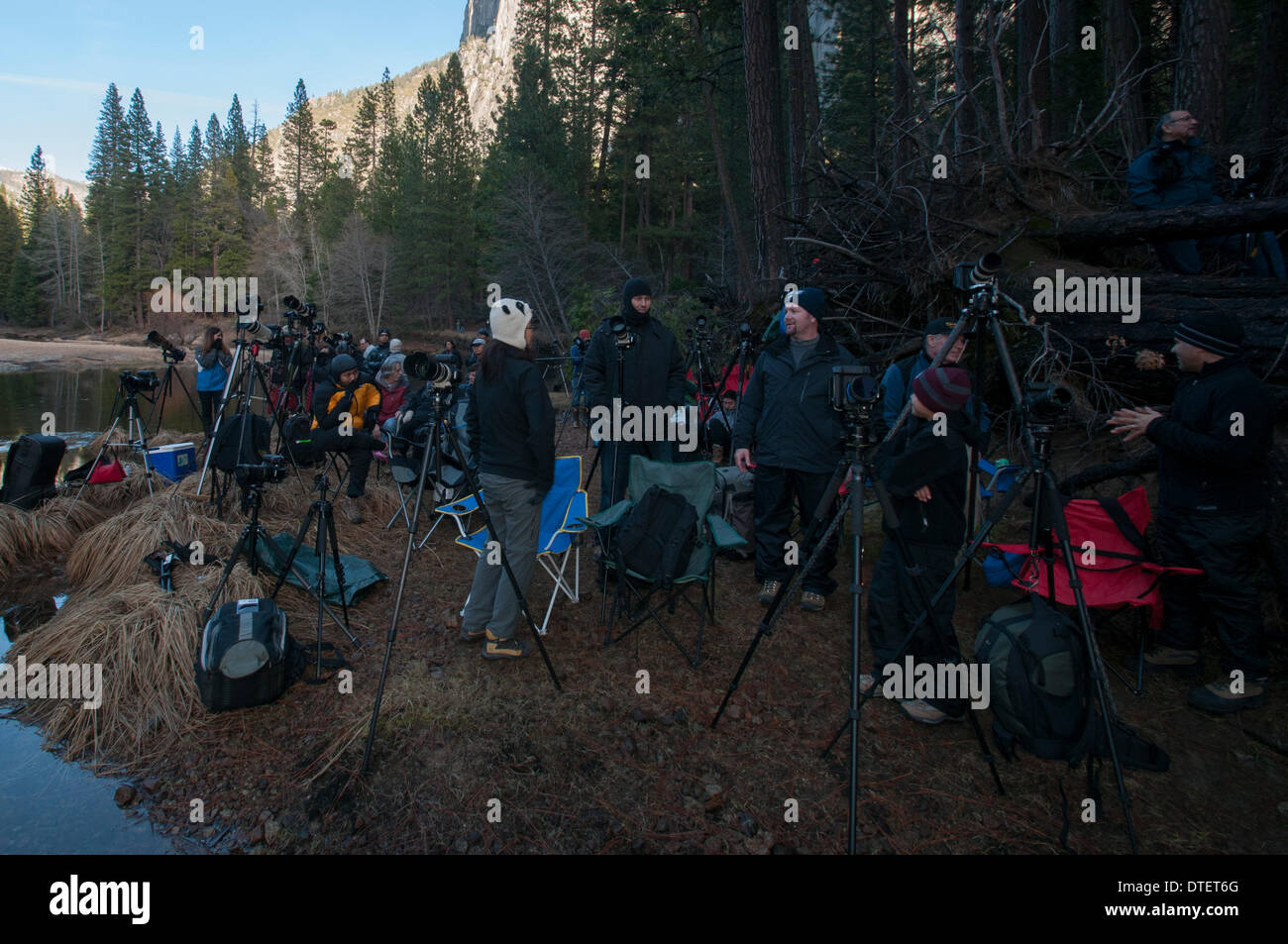 Yeosemite National Park, CA, USA . 16th Feb, 2014. Yosemite National Park, dozens of photographers anxiously await arrival of last rays of setting sun to bath the waters of Horsetail Fall in brilliant orange. Conditions have to be perfect for the phenomenon to occur for a short span in mid-February. Credit:  Ross Way/Alamy Live News Stock Photo