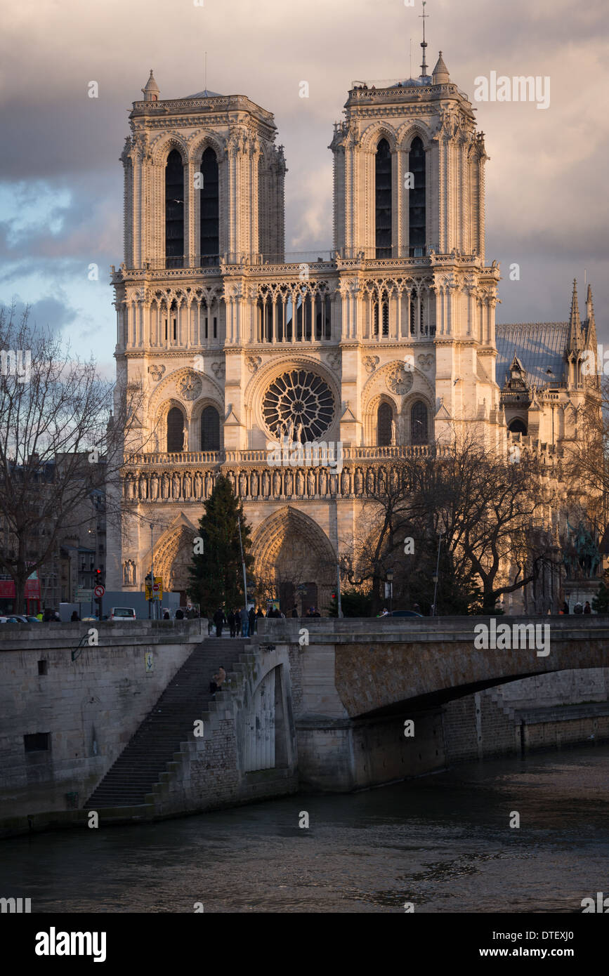 Notre Dame cathedral seen from the river Seine on a late winter afternoon Stock Photo