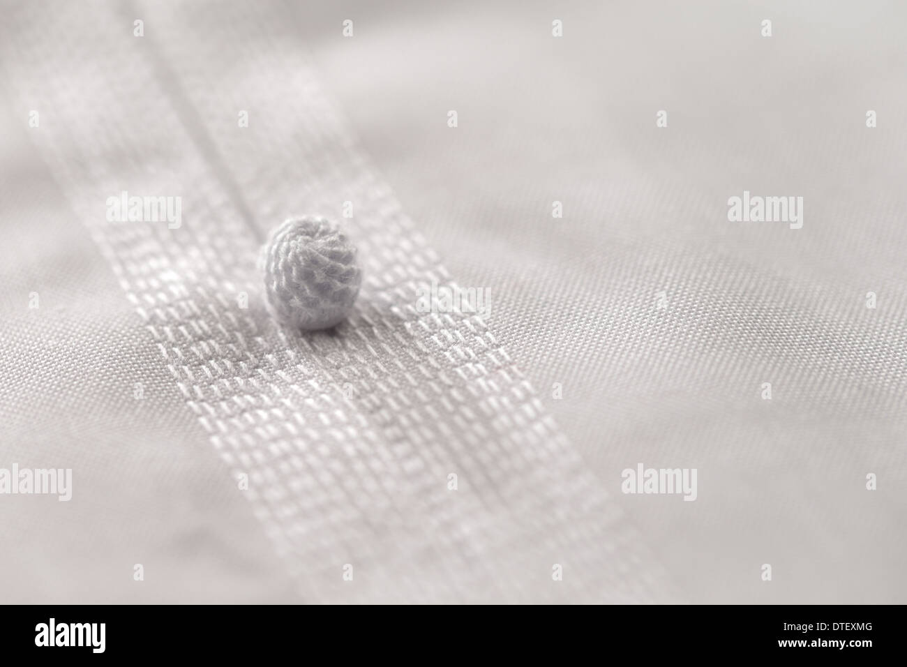 Detailed stitching of Kandura, the ankle-length garment Stock Photo