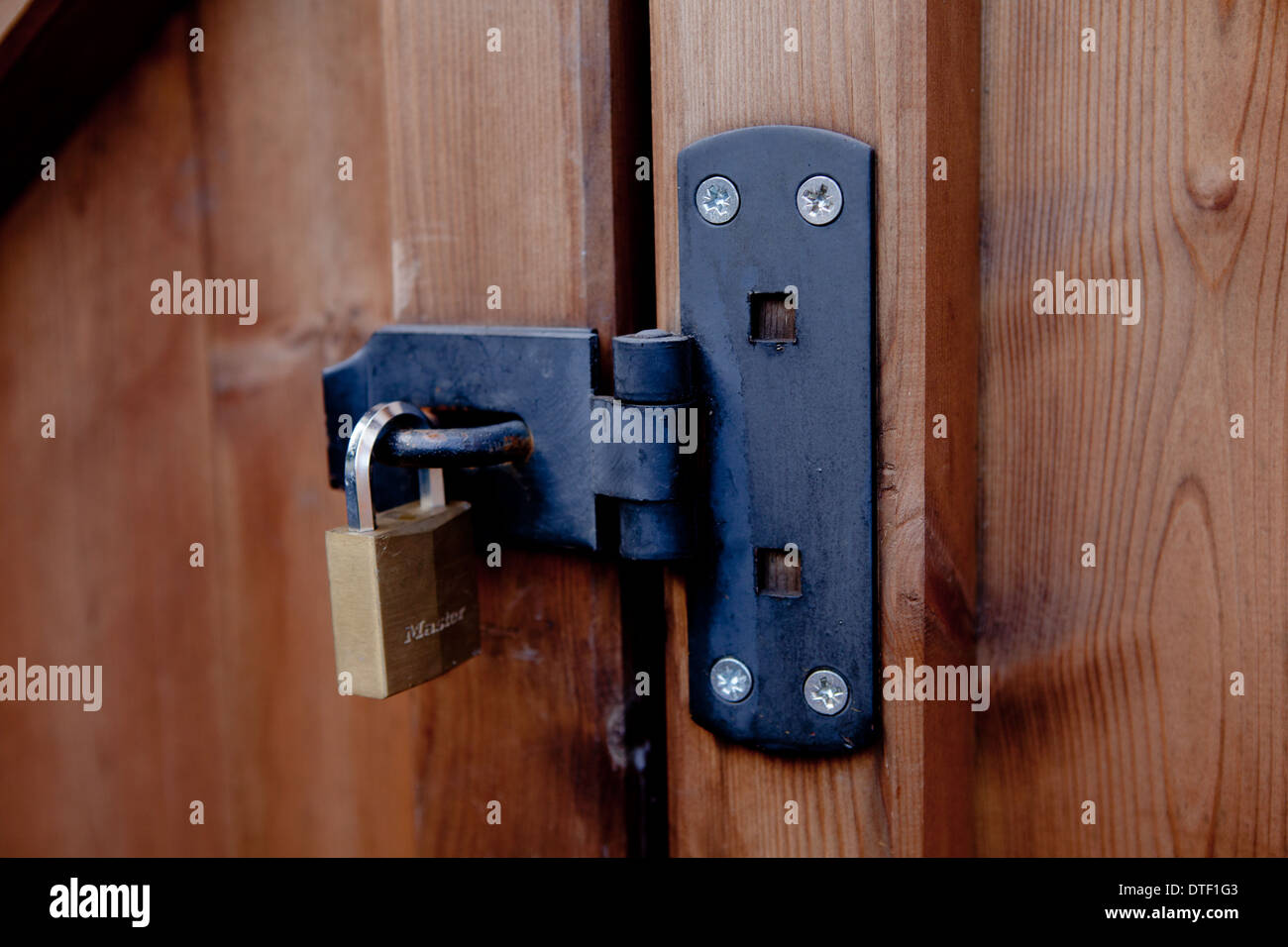 T Shaped Security bar Hasp and Staple  with padlock Stock Photo