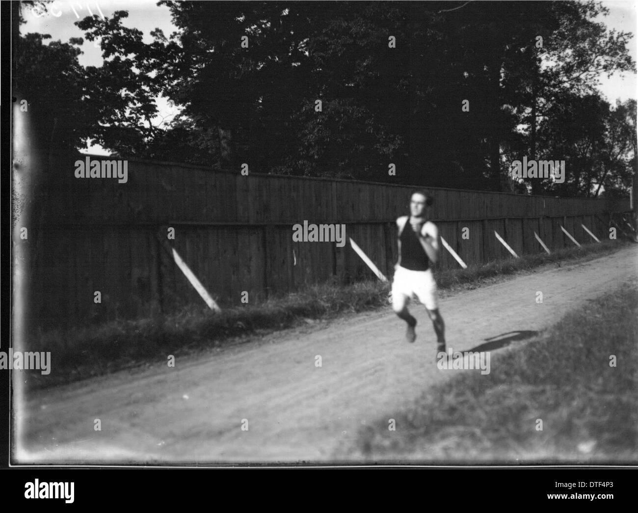 Runner at high school track and field meet 1912 Stock Photo Alamy