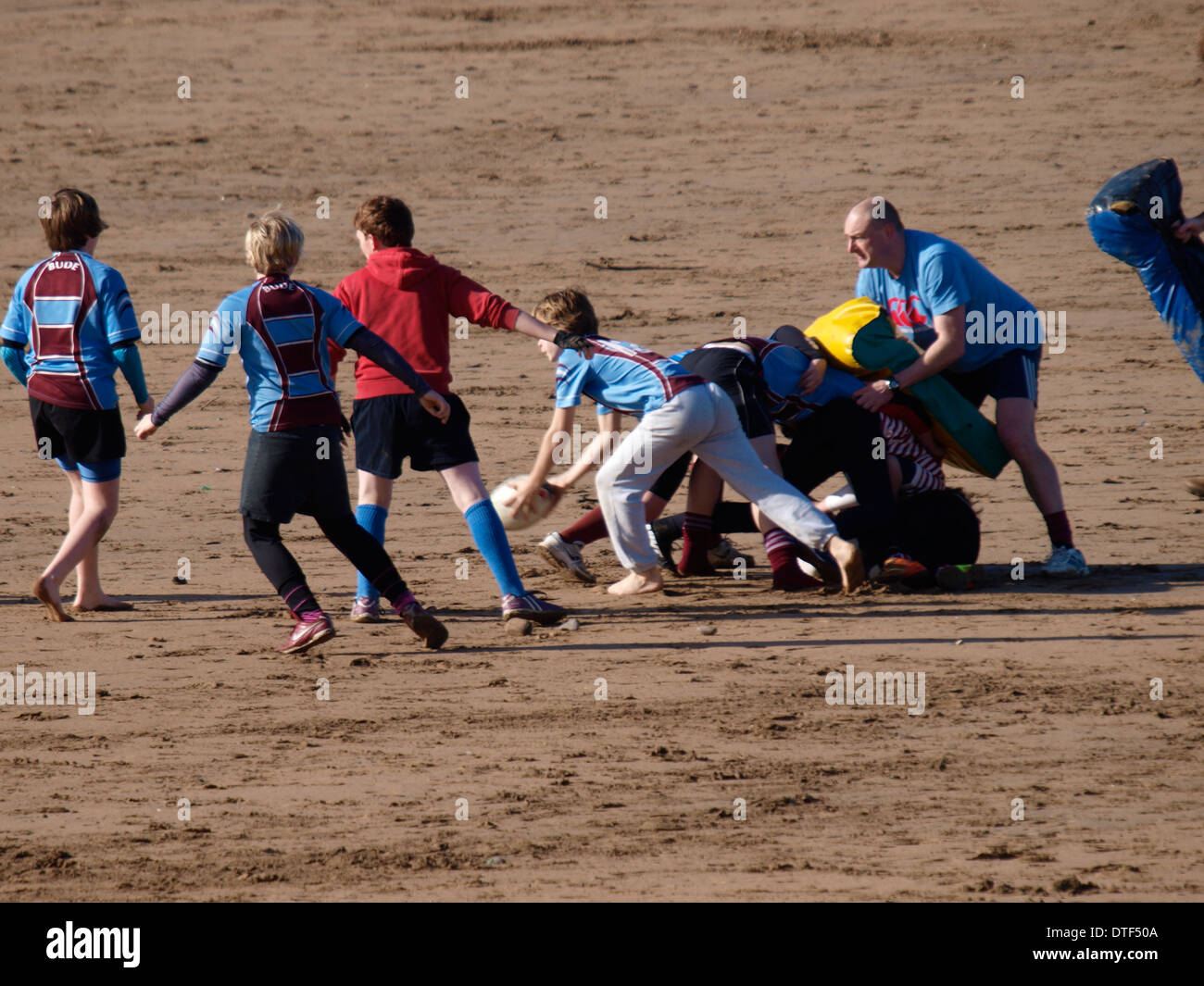 Junior rugby training at the beach, Summerleaze beach, Bude, Cornwall