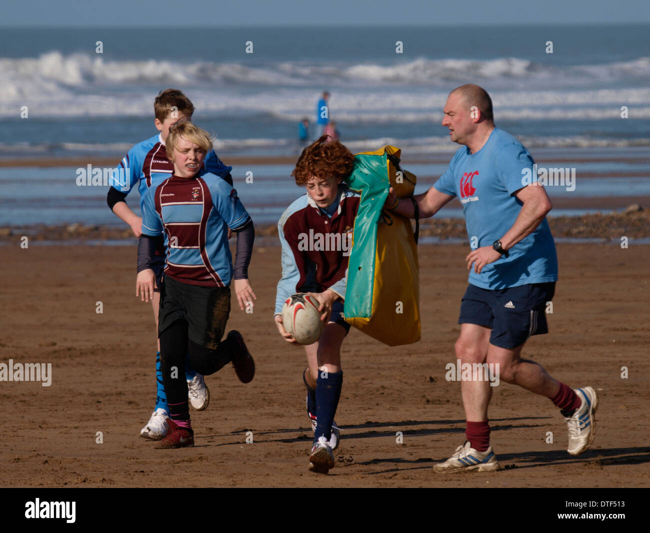 Junior rugby training at the beach, Summerleaze beach, Bude, Cornwall