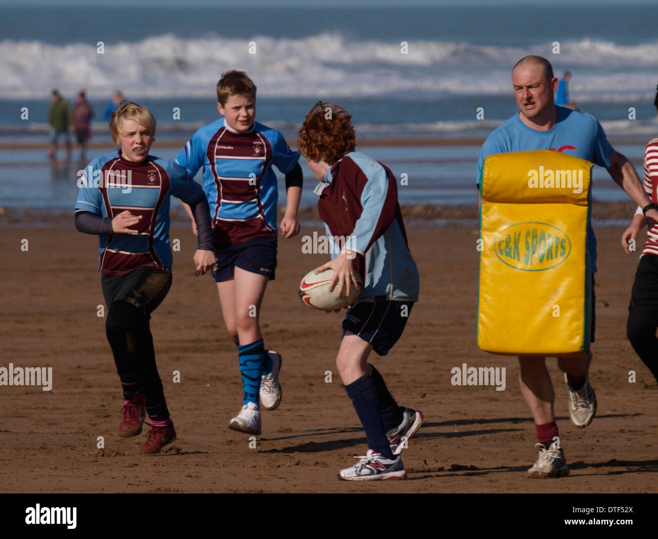 Junior rugby training at the beach, Summerleaze beach, Bude, Cornwall