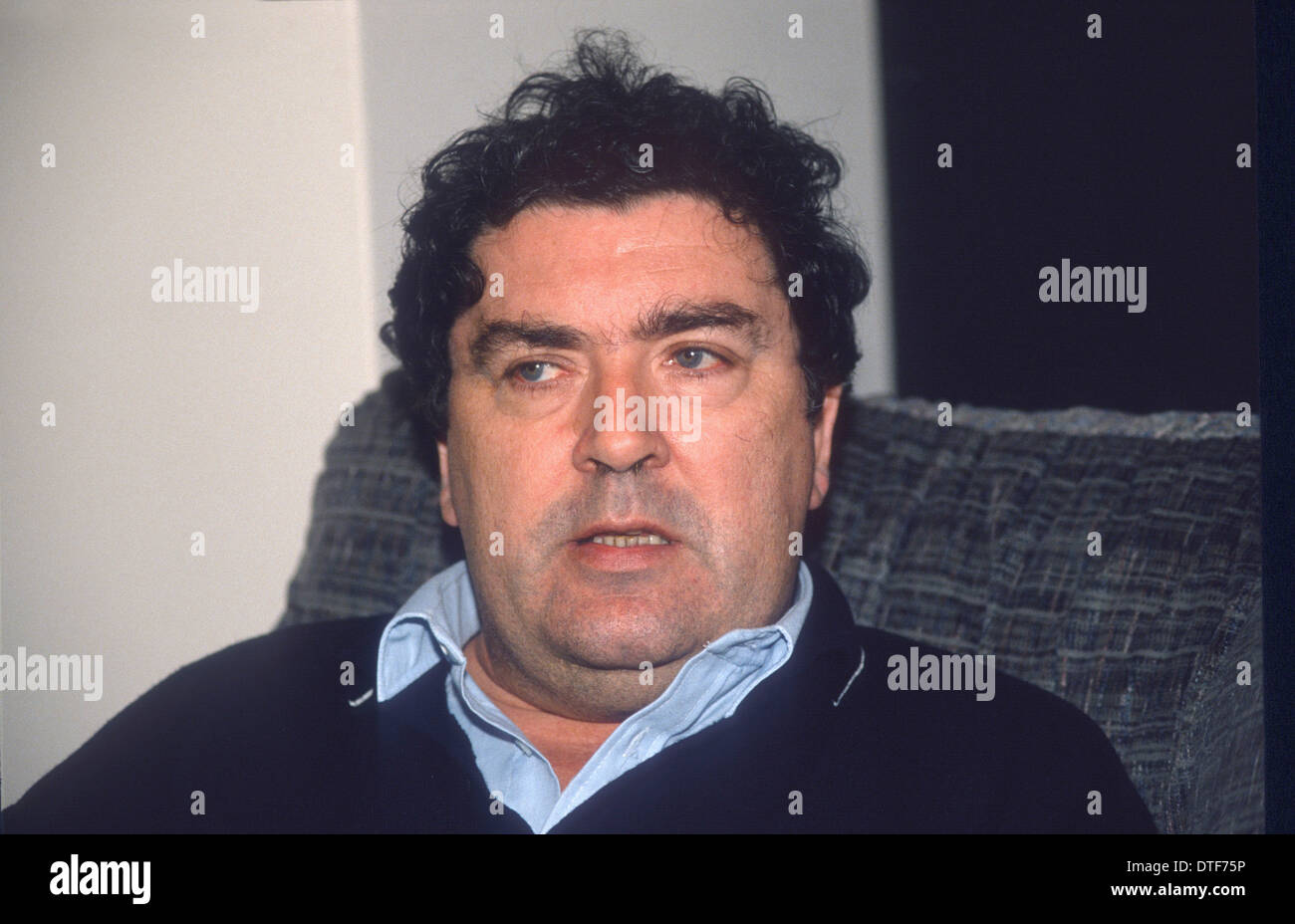 A YOUTHFULL JOHN HUME PHOTOGRAPHED IN HIS HOME IN NORTHERN IRELAND Stock Photo