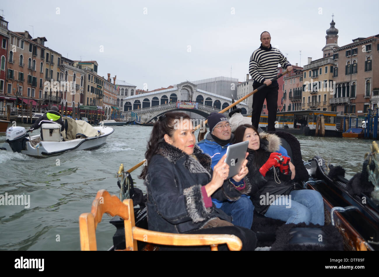 Venice, Italy, A Gondola Ride  can be the peak of your tour as you areglided along byyour musical Gondolier singing 'O Sole Mio' Stock Photo