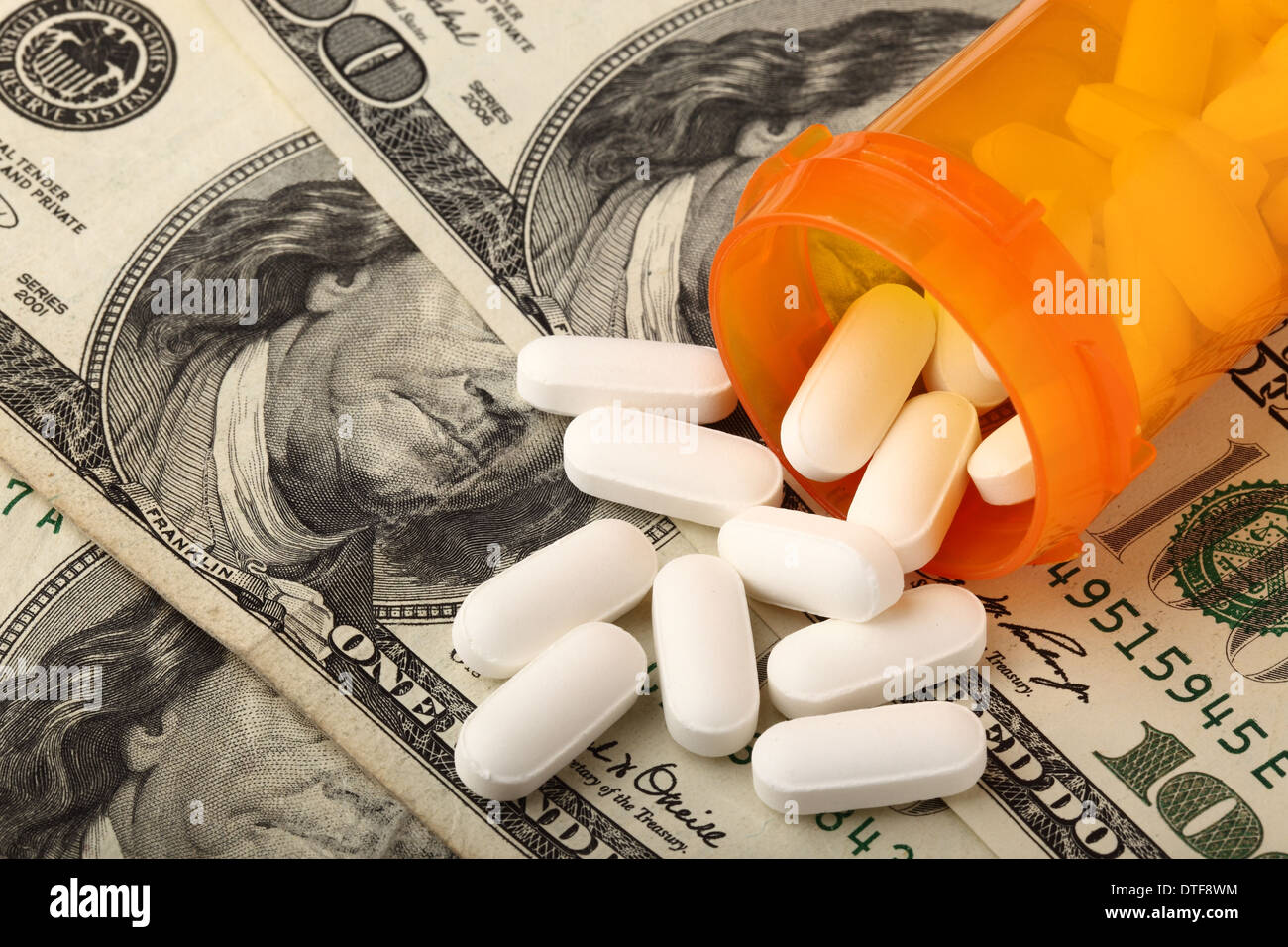 Prescription drugs with US dollar to indicate medicine is very Stock